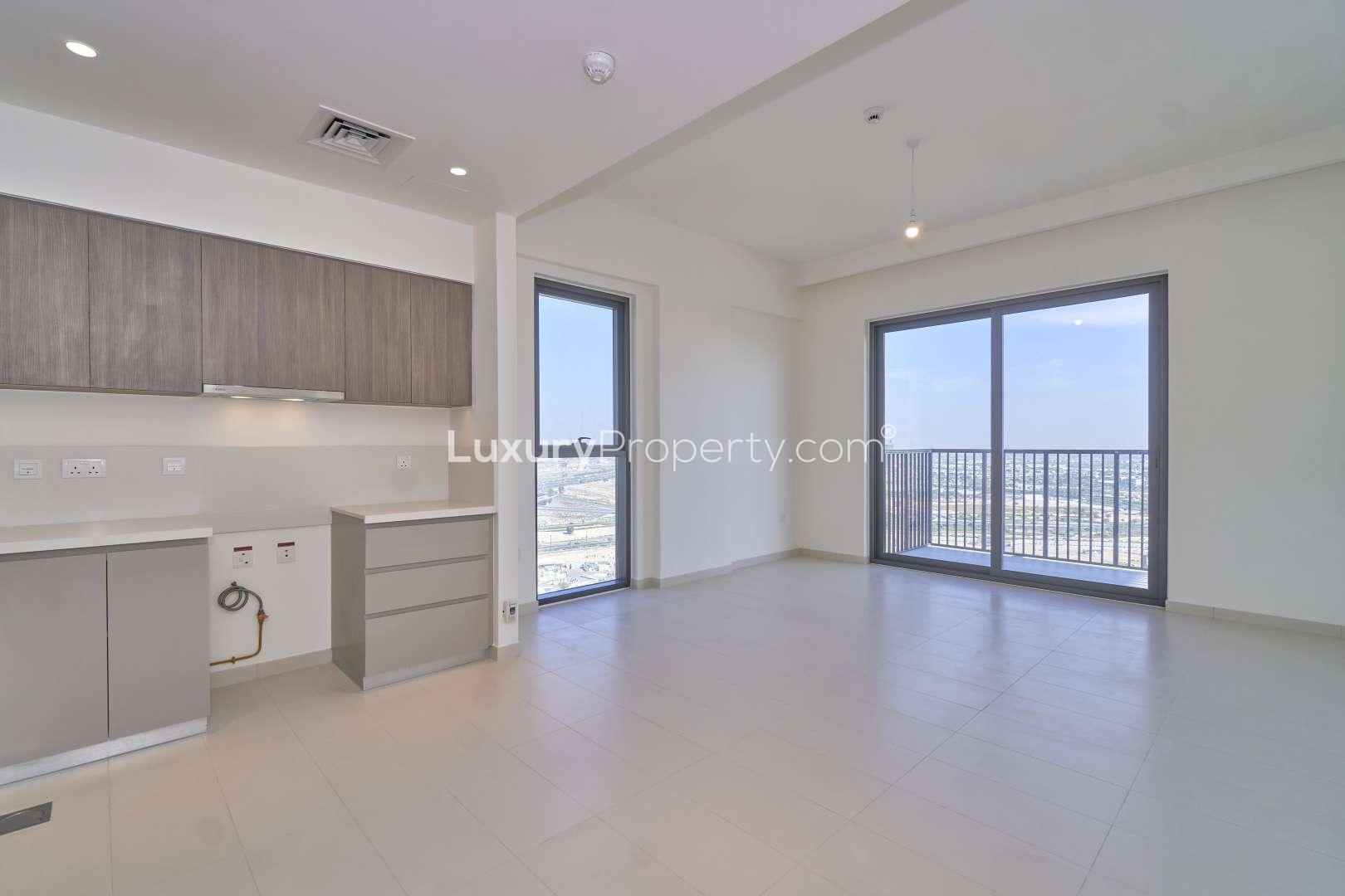 Balcony view from 1-bedroom apartment in Park Ridge, Dubai Hills Estate, overlooking cityscape