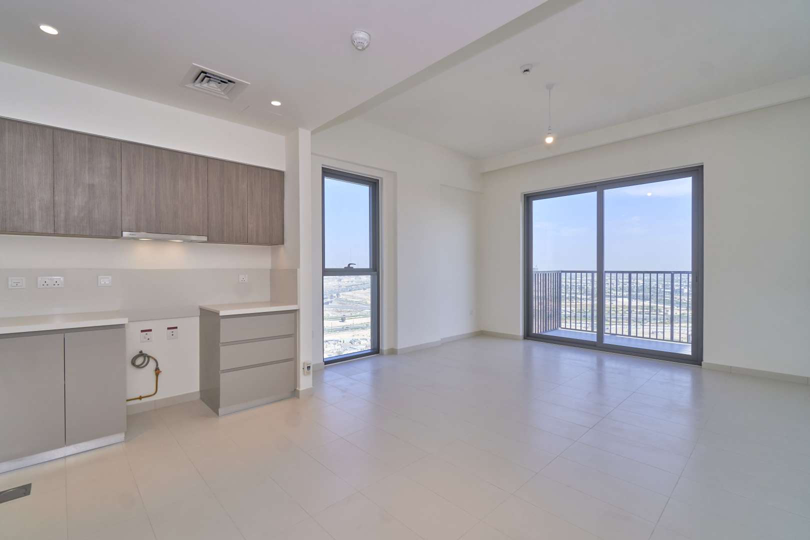 Balcony view from 1-bedroom apartment in Park Ridge, Dubai Hills Estate, overlooking cityscape