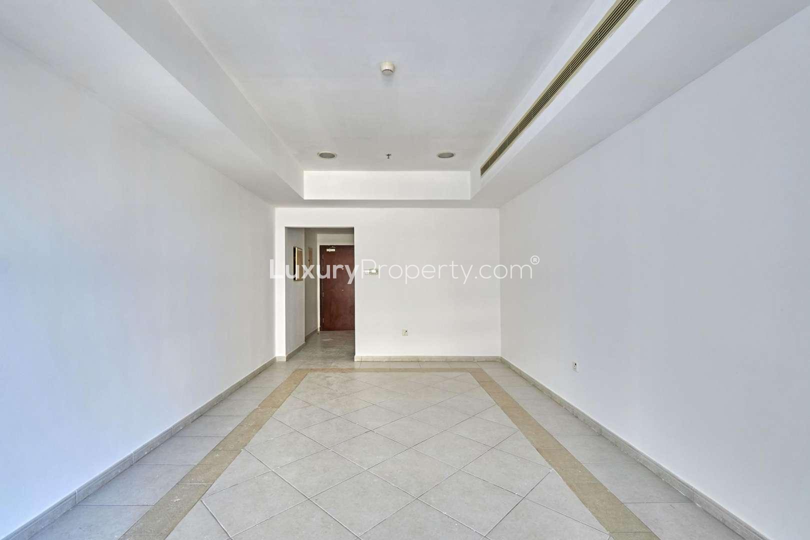 Empty living room in luxury one-bedroom apartment, Princess Tower, Dubai Marina