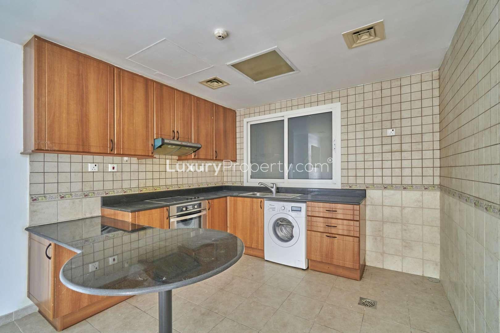 Empty living room in luxury one-bedroom apartment, Princess Tower, Dubai Marina for rent