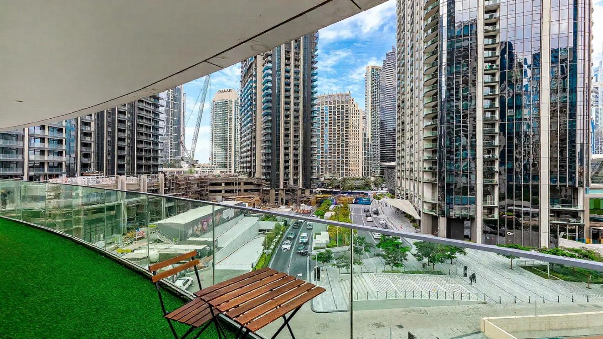 Spacious living room in Opera Grand apartment, Downtown Dubai, with cityscape views