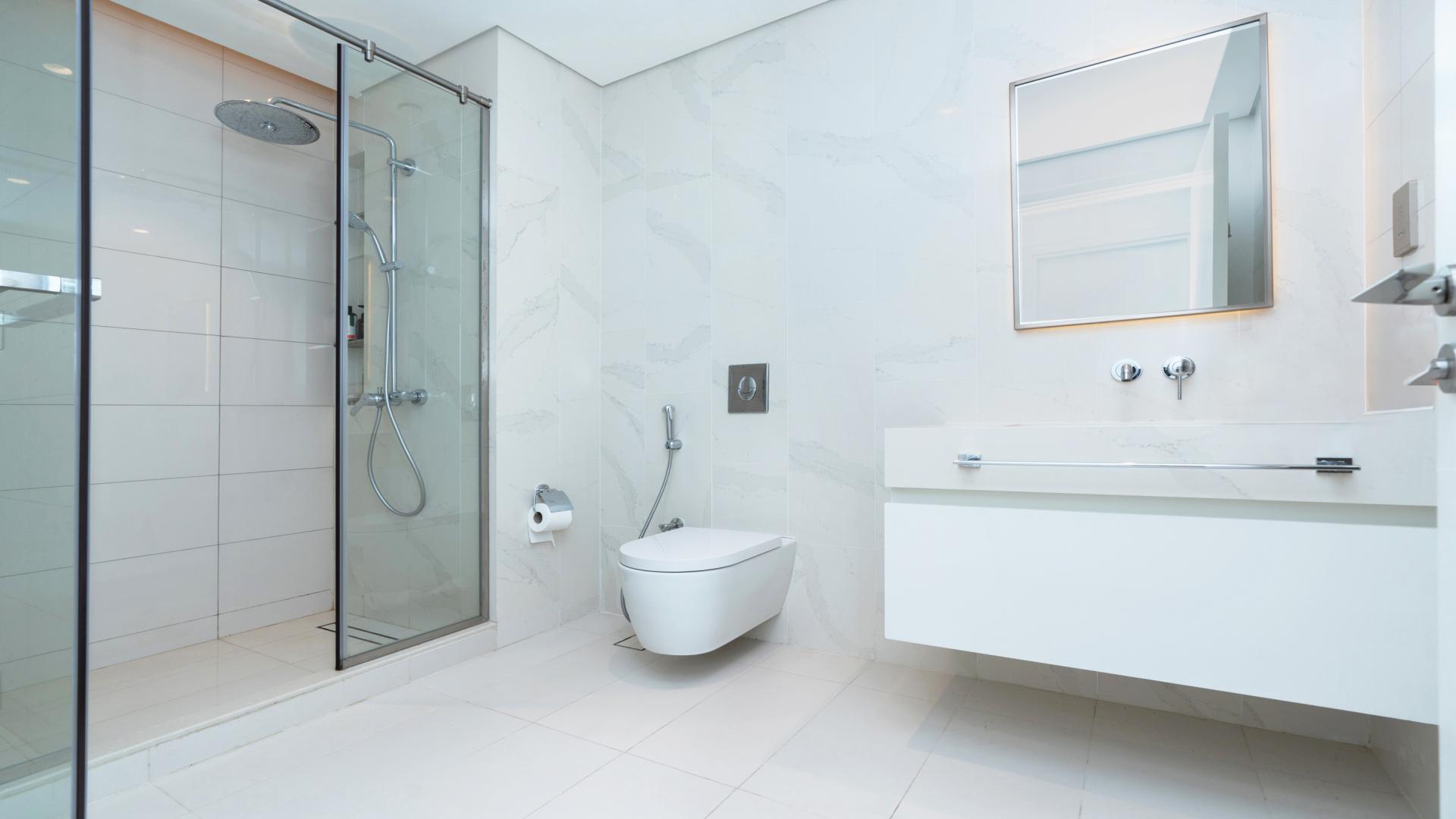 High-floor furnished apartment kitchen and living area in Beach Vista, Emaar Beachfront, Dubai Harbour