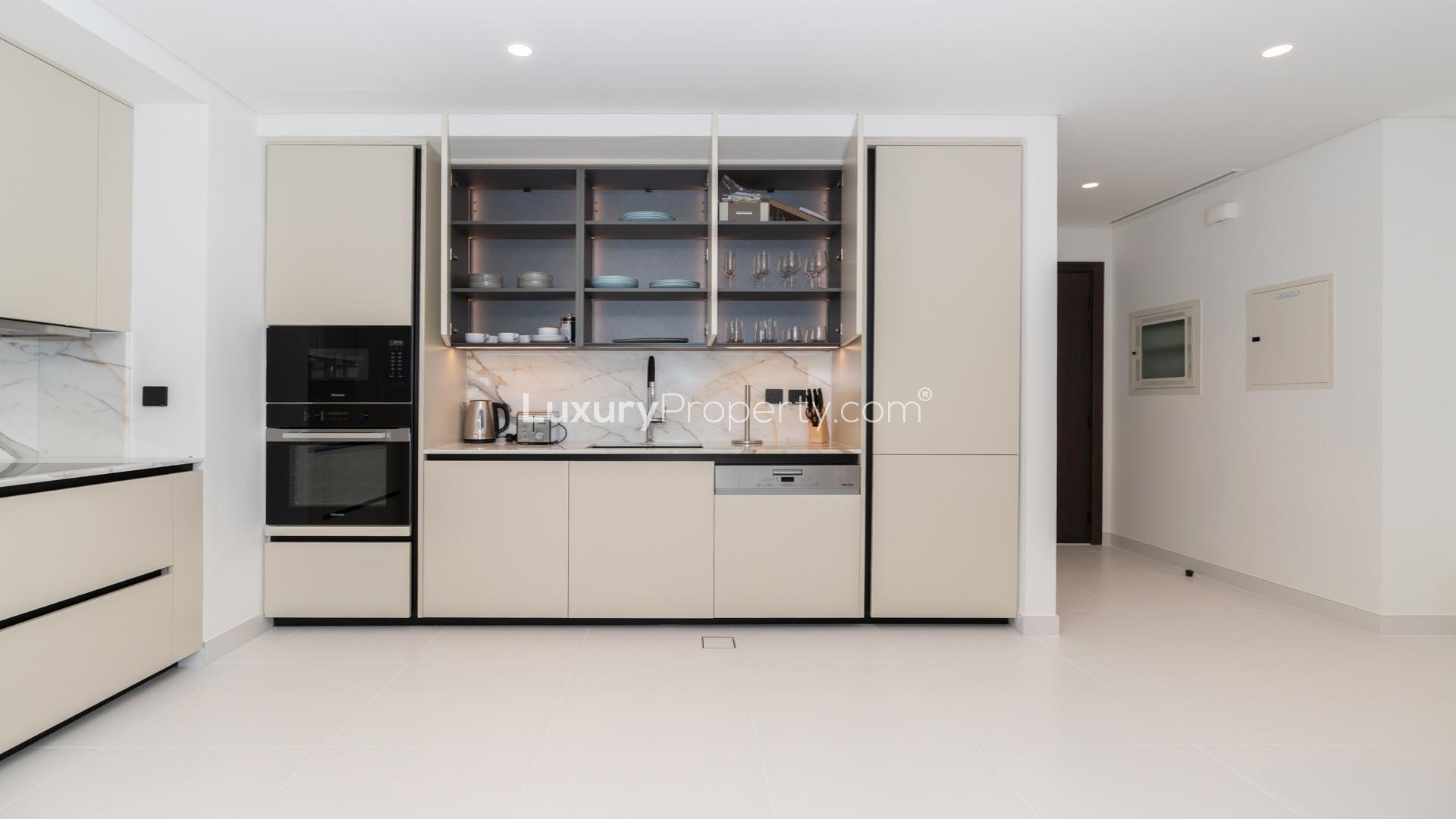 Modern living area in one-bedroom apartment at Marina Vista, Emaar Beachfront, Dubai Harbour