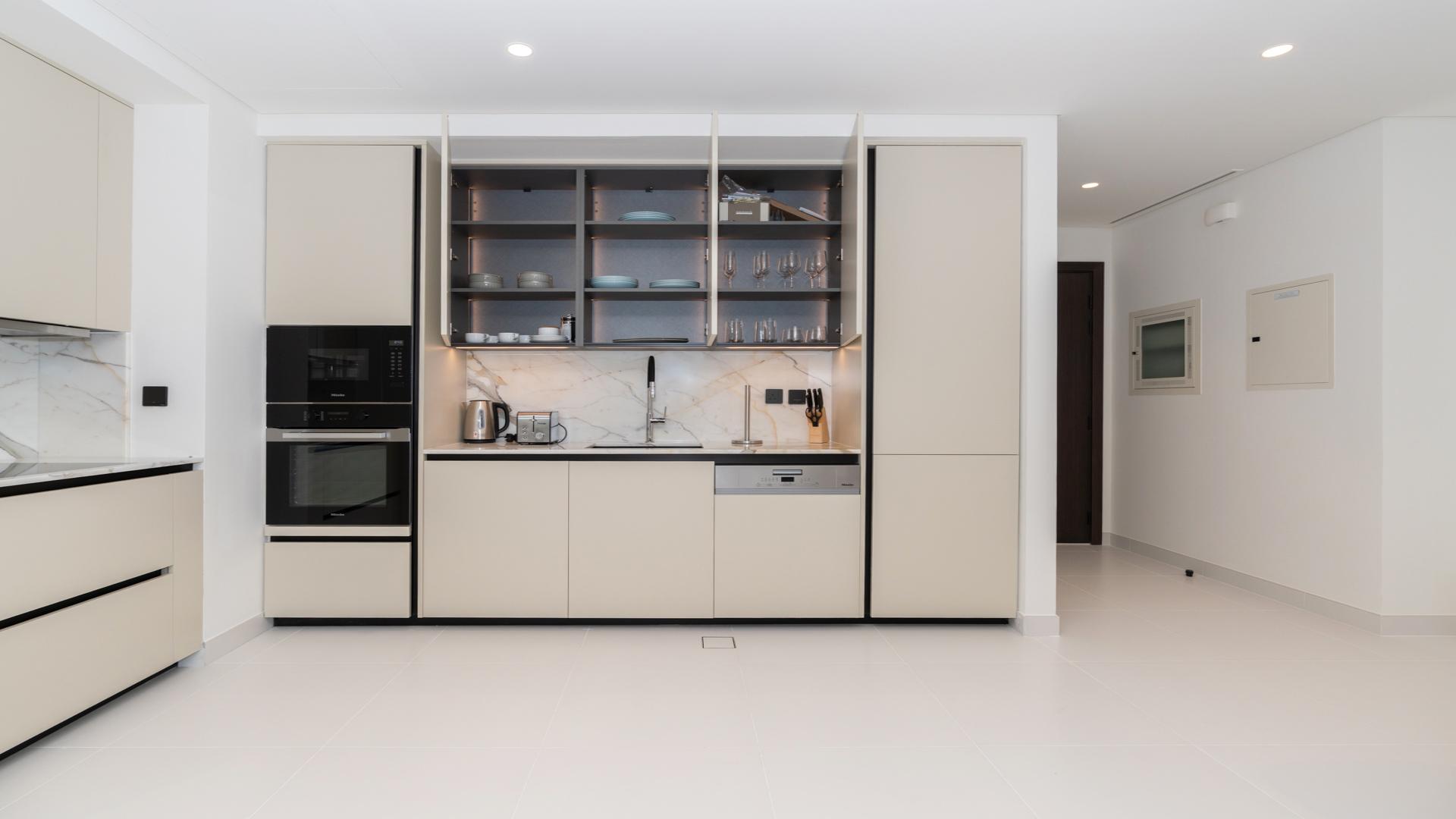 Modern living area in one-bedroom apartment at Marina Vista, Emaar Beachfront, Dubai Harbour