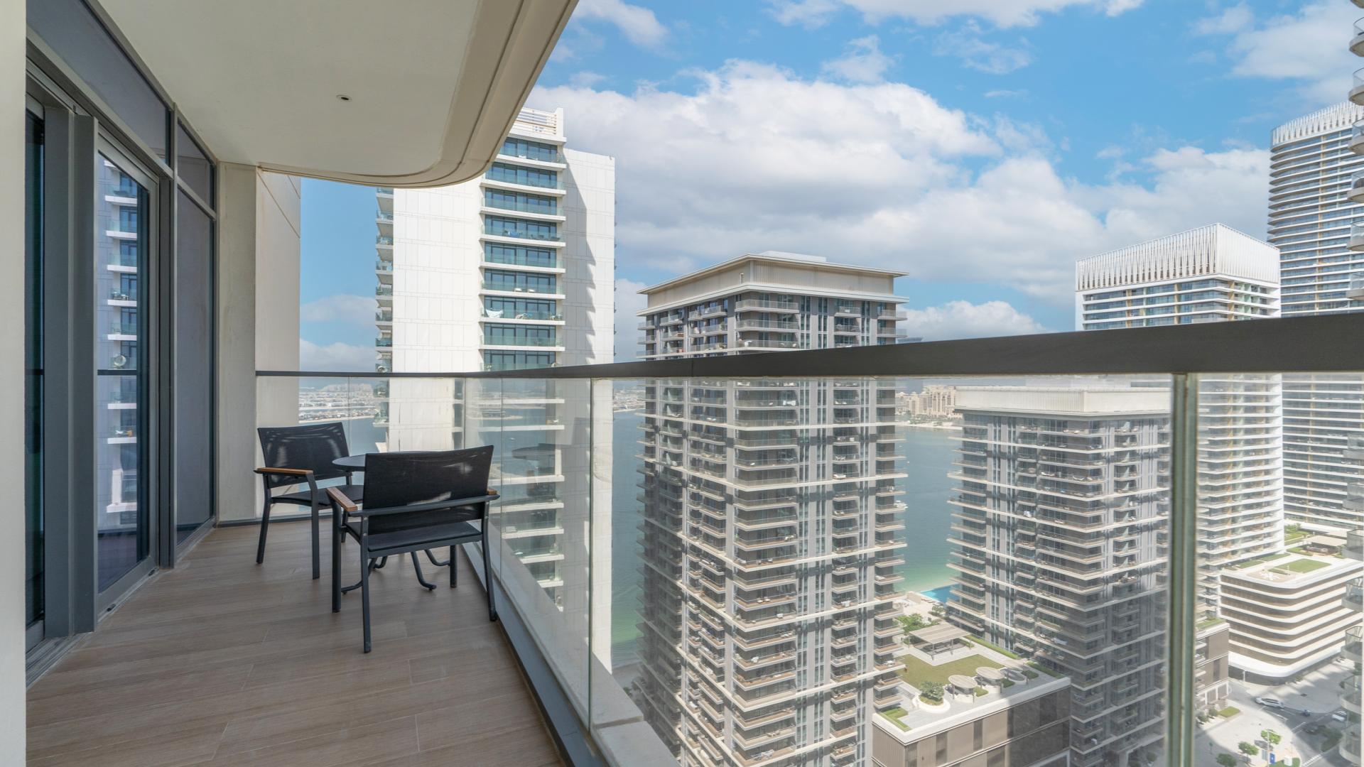 Aerial view of Emaar Beachfront apartment, Dubai Harbour, with pool and beach access