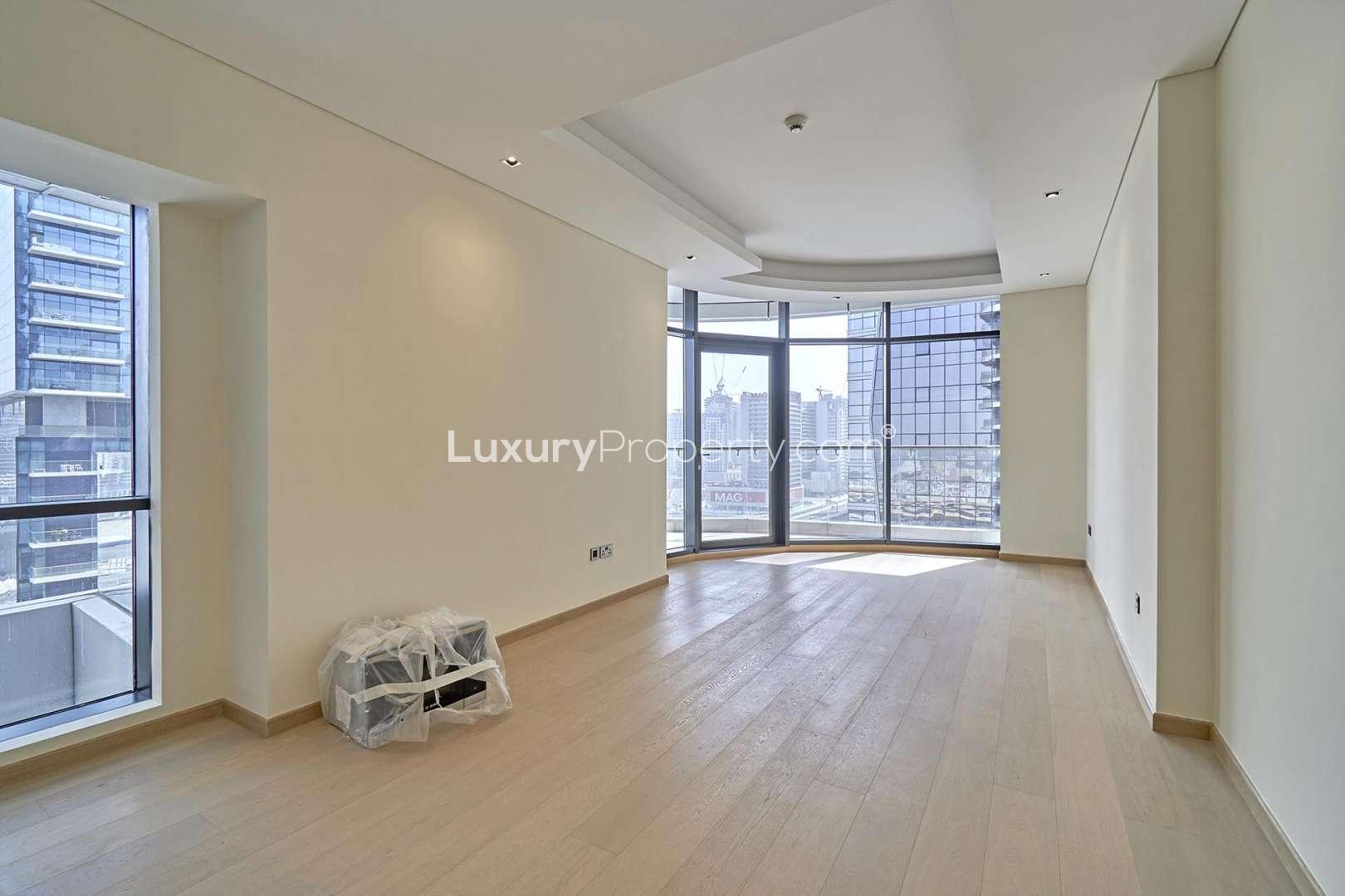 Luxurious empty apartment interior with large windows in RP Heights, Downtown Dubai