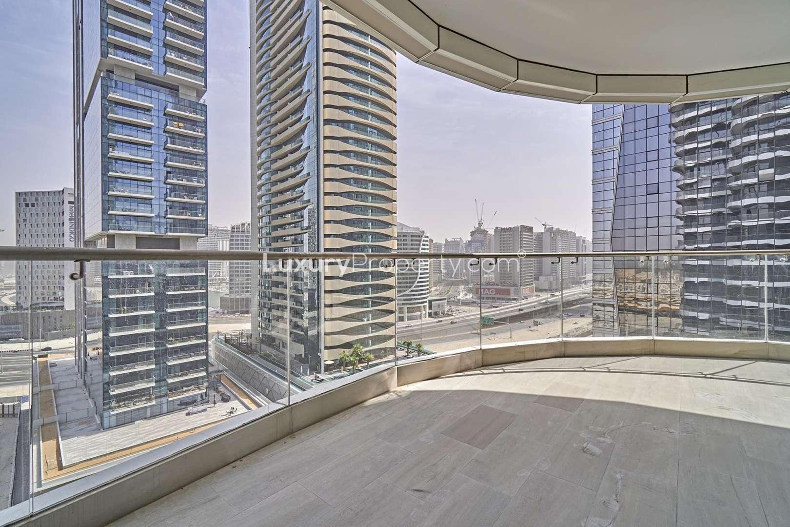 Luxurious empty living room in 1-bedroom apartment, RP Heights, Downtown Dubai, large windows