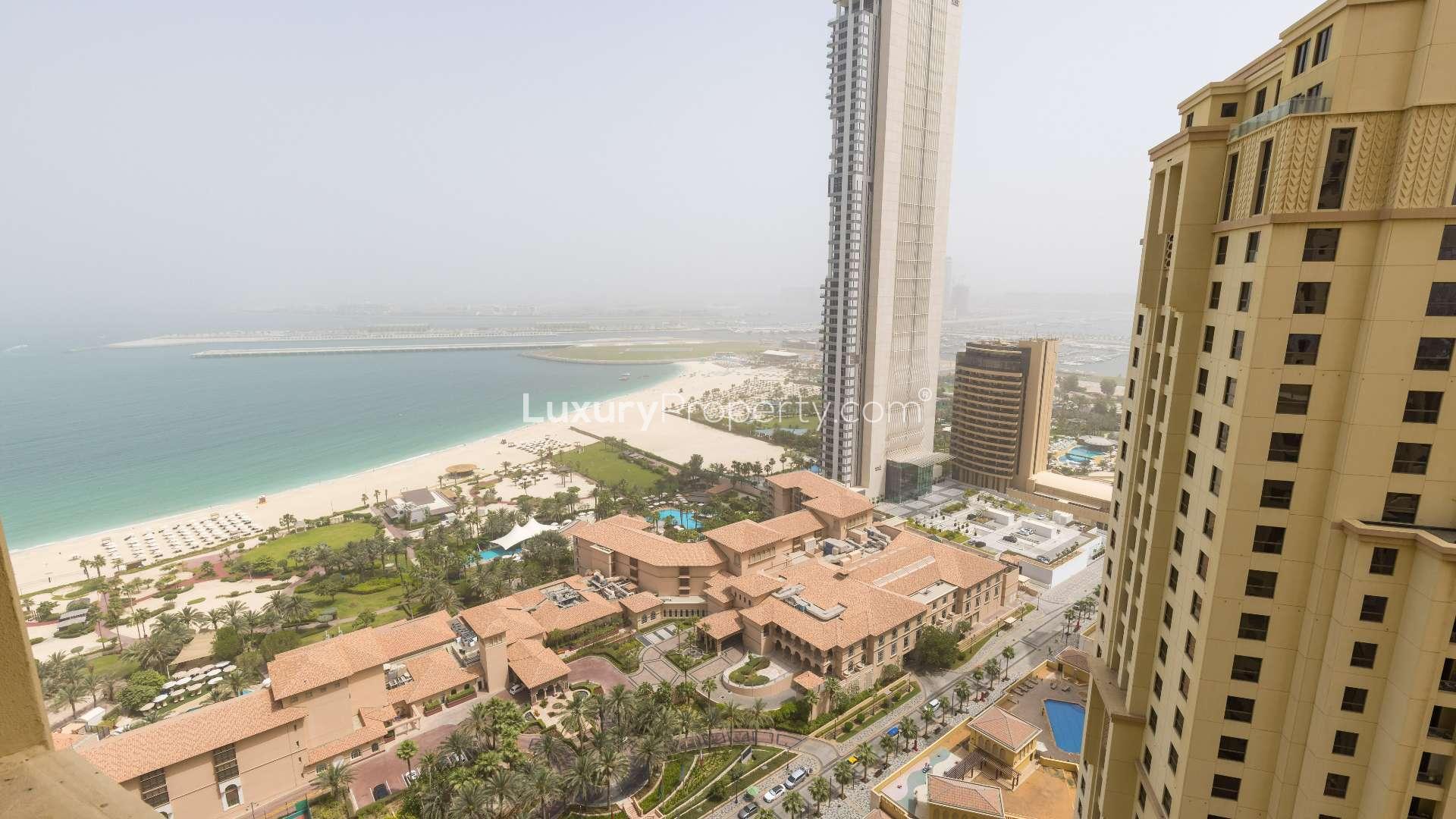 Empty living room in spacious 1-bedroom apartment, Sadaf, Jumeirah Beach Residence for rent