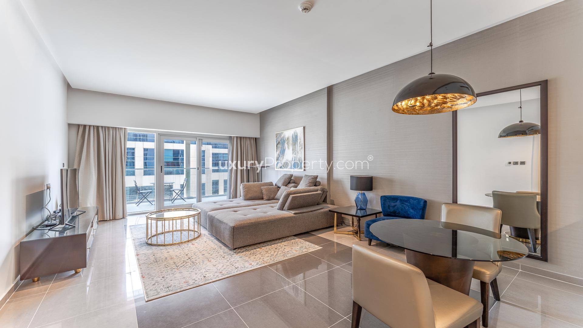 Modern living room in 1-bedroom DAMAC Majestine apartment, Business Bay, available for rent