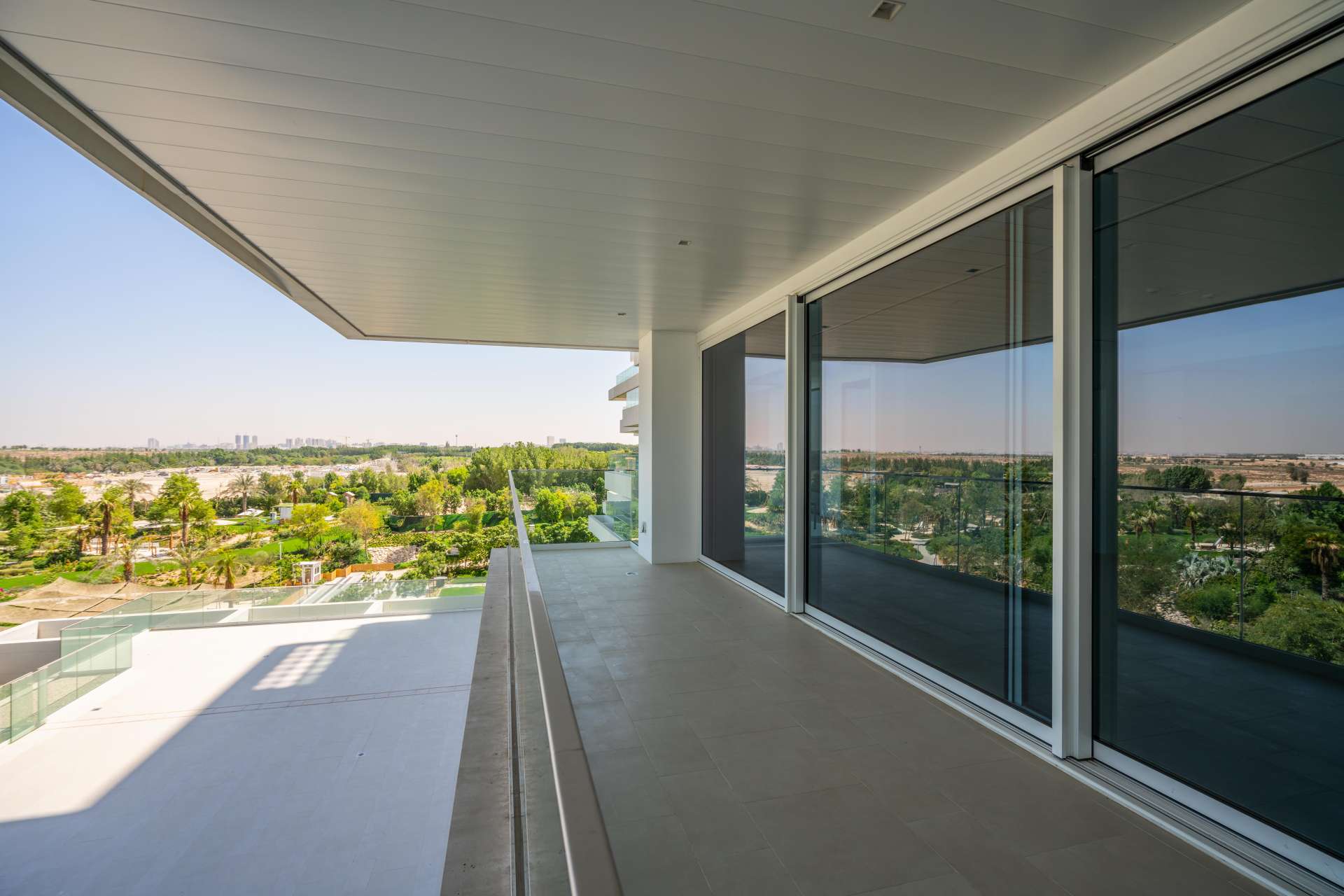Modern kitchen with large windows in 1-bedroom apartment, Seventh Heaven, Al Barari