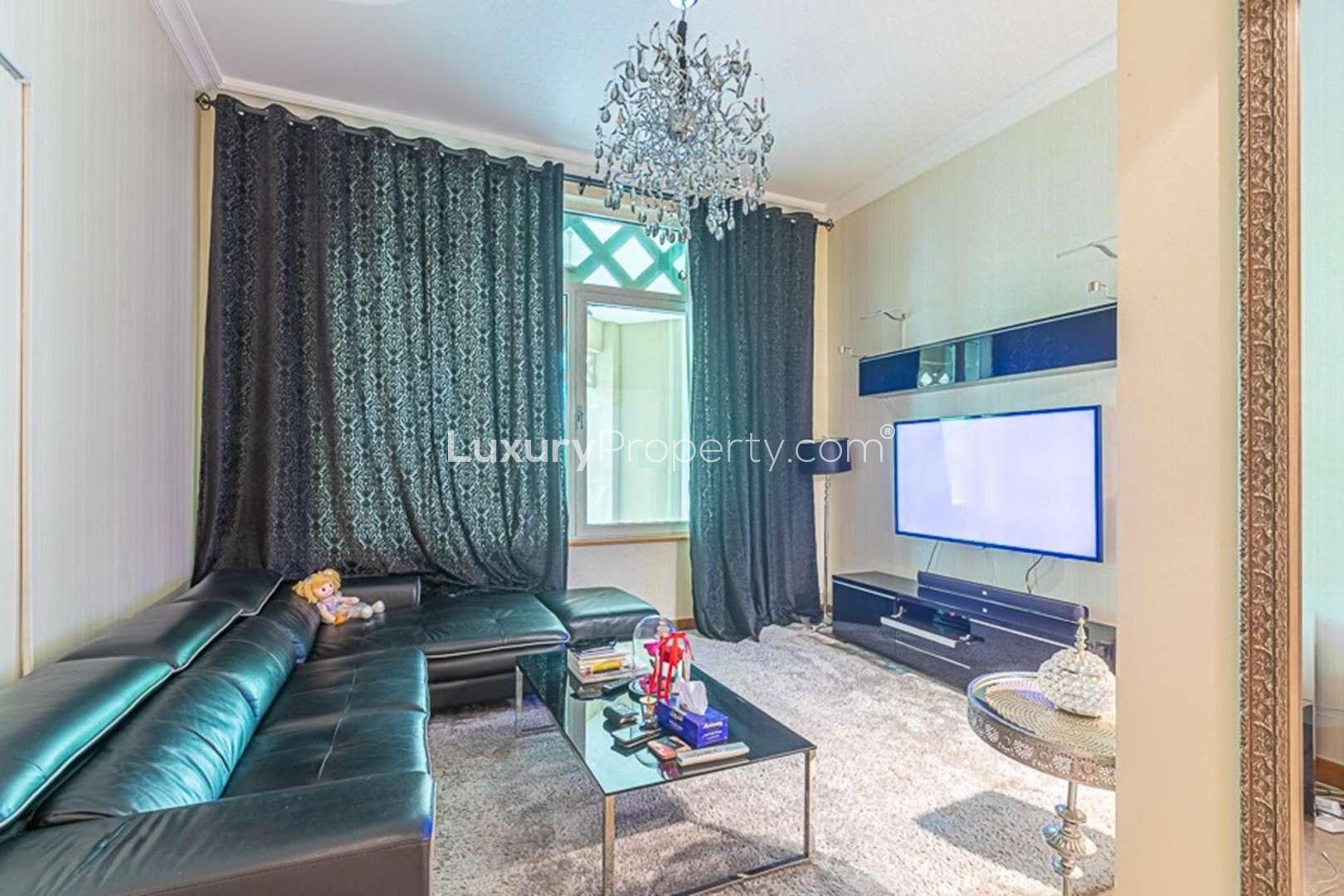 Furnished one-bedroom apartment view, Shoreline Apartments, Palm Jumeirah, lush greenery, modern architecture