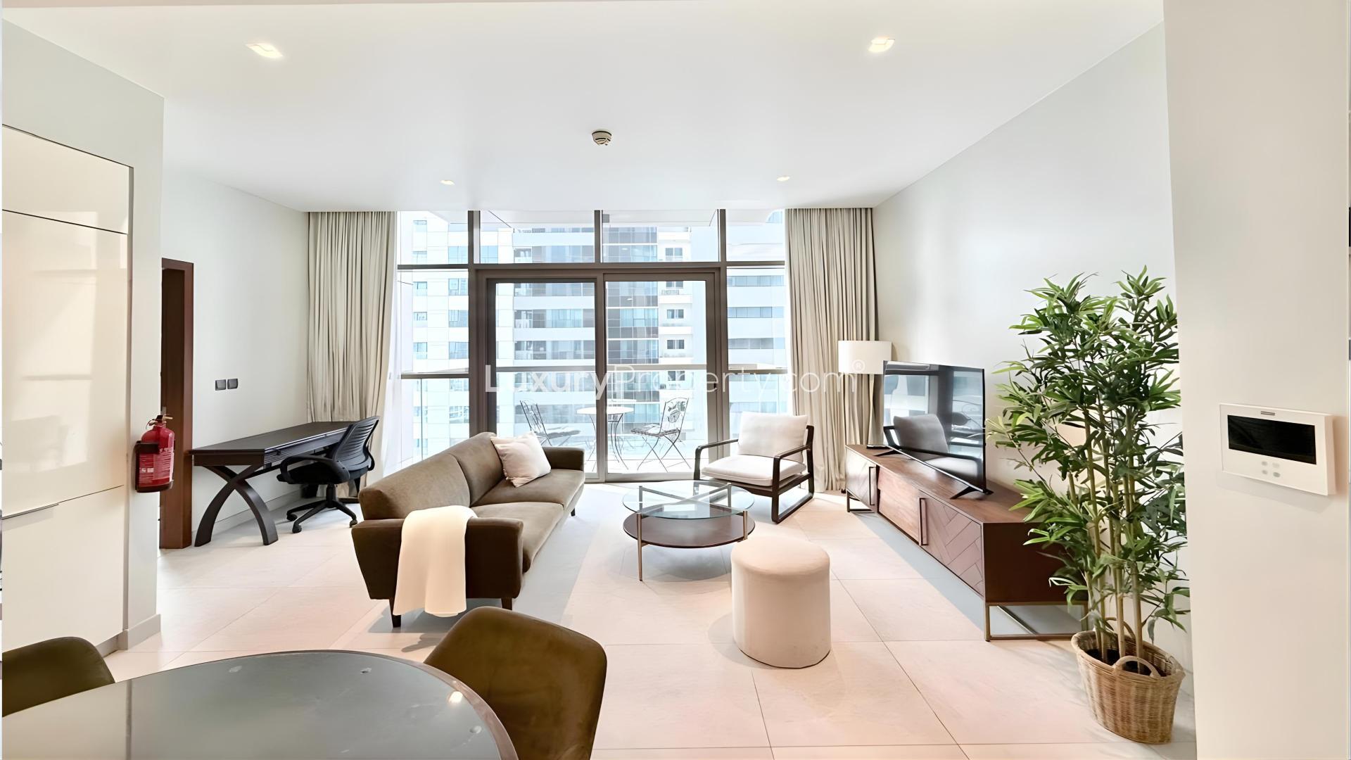 Modern living room in luxury Dubai Marina apartment, featuring stylish decor and open layout