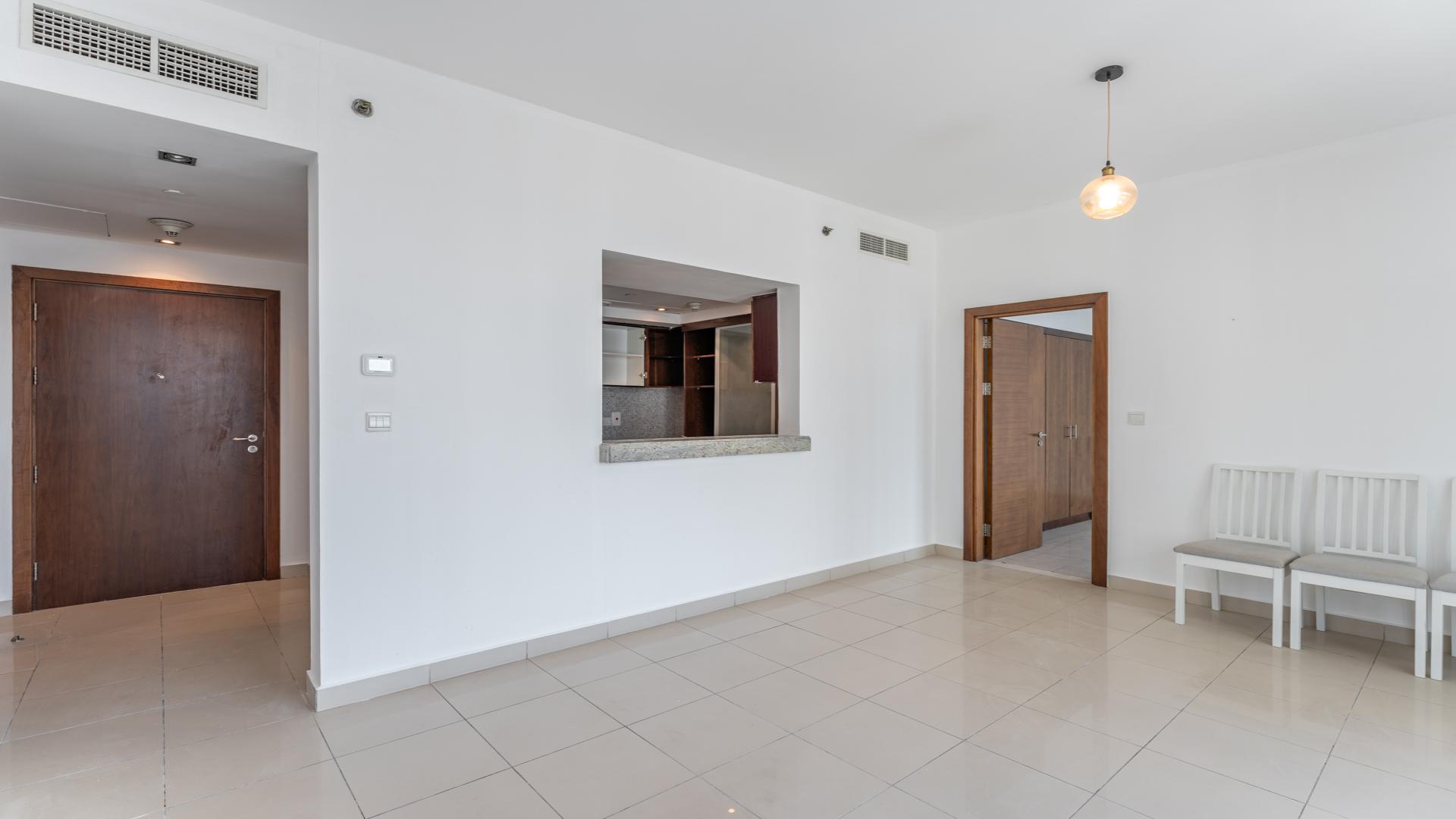 Modern kitchen in 1-bedroom apartment, Bonaire Tower, Dubai Marina, with sleek cabinetry and countertops