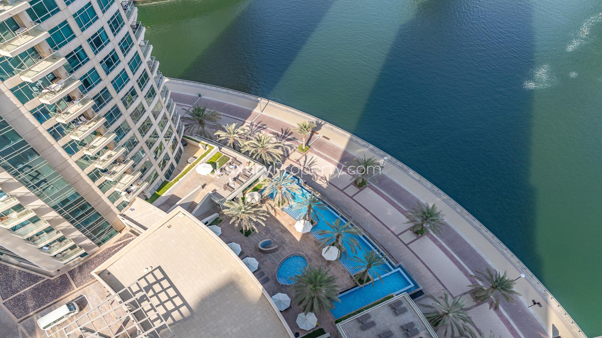 High-floor balcony view of Dubai Marina skyline from Park Island apartment