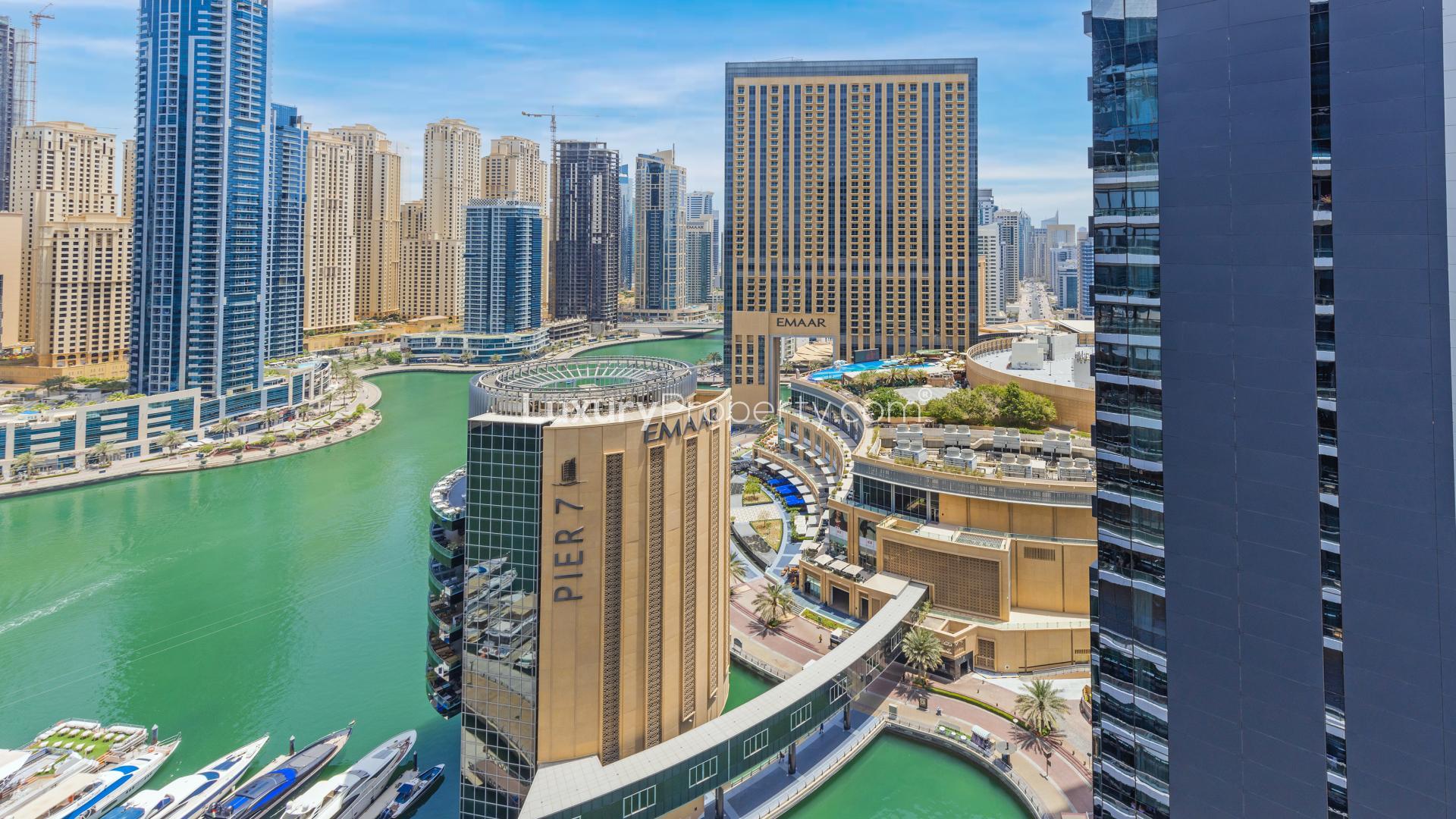 Bright apartment interior with large windows and stunning Dubai Marina view, Silverene community