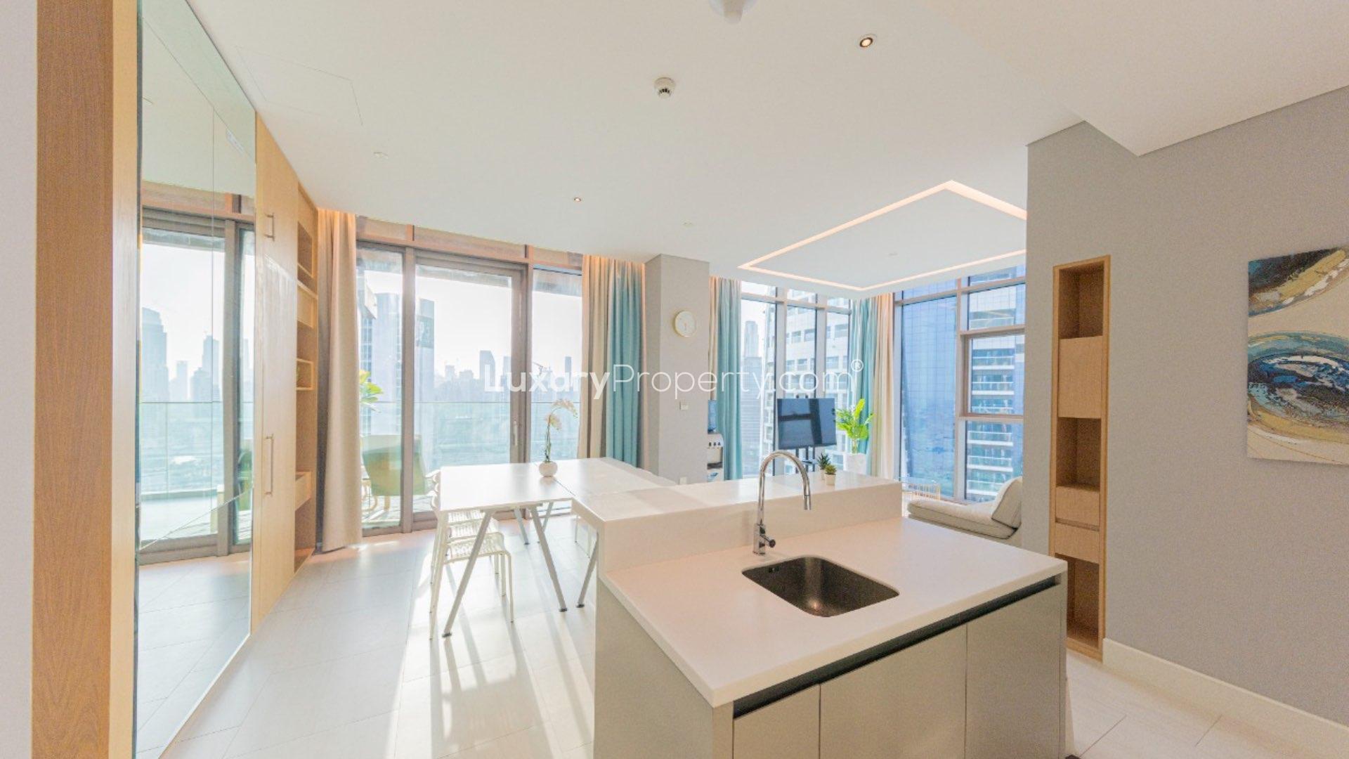 Modern 1-bed apartment living room with Dubai skyline views in Business Bay