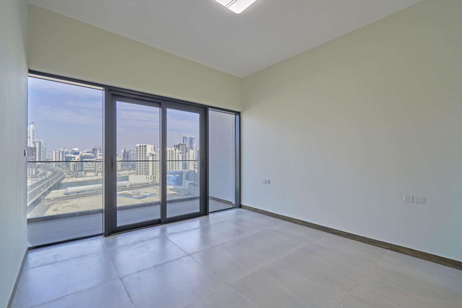 Bright living room in 1-bedroom apartment, SOL Bay, Business Bay, with city view balcony