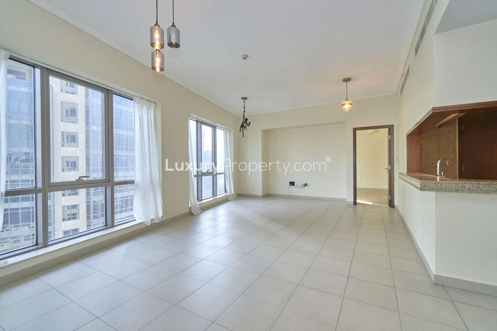 Spacious living room with large windows in South Ridge Tower 4, Downtown Dubai apartment