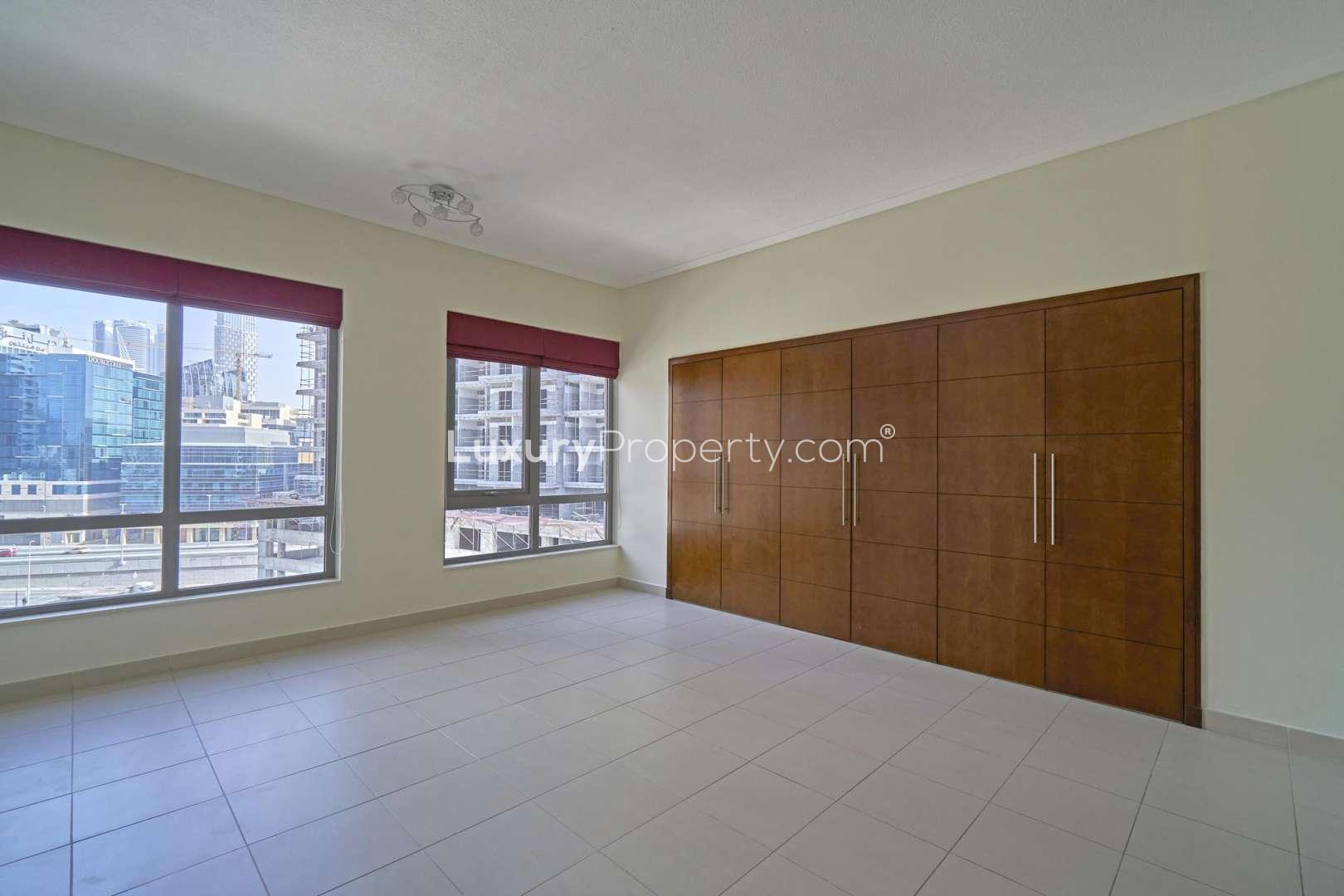 Studio apartment interior with large windows in South Ridge 2, Downtown Dubai
