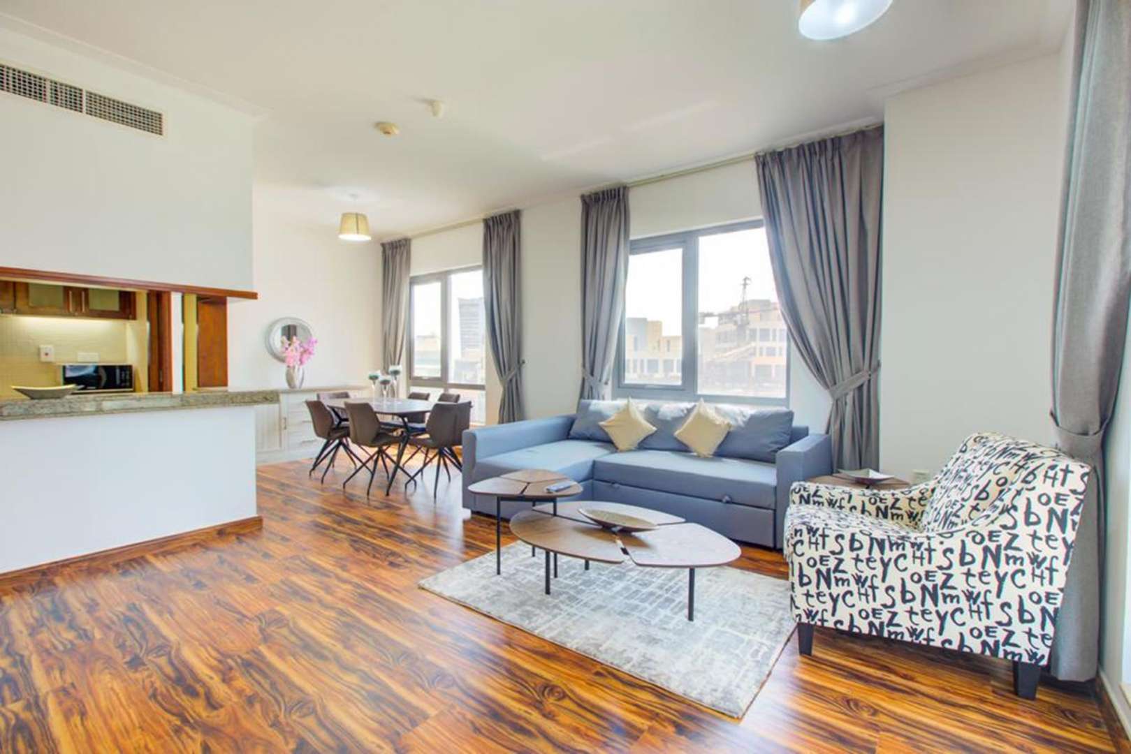 Modern living room in 1-bedroom apartment, South Ridge, Downtown Dubai, with stylish furnishings