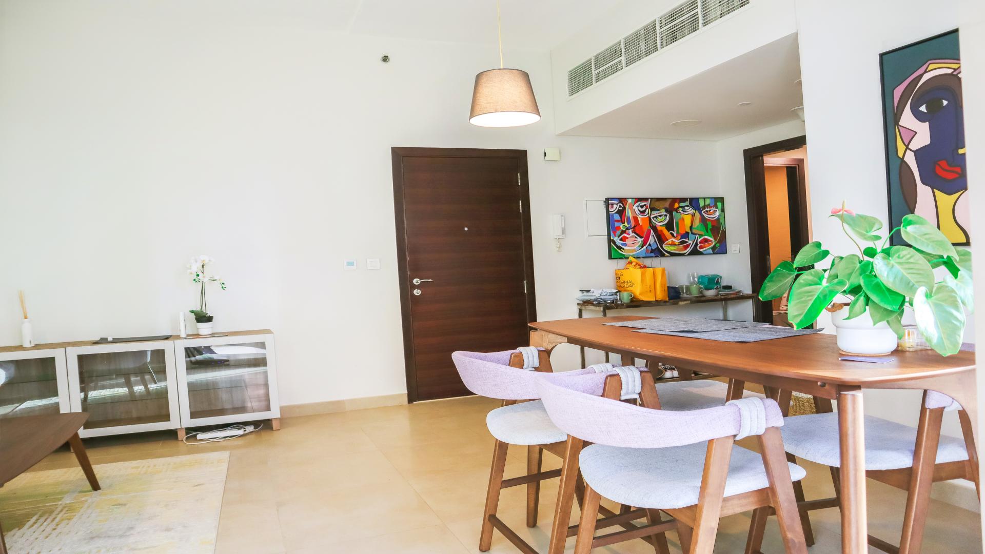 Elegant dining area in 1-bedroom apartment, Sparkle Towers, Dubai Marina, with modern decor