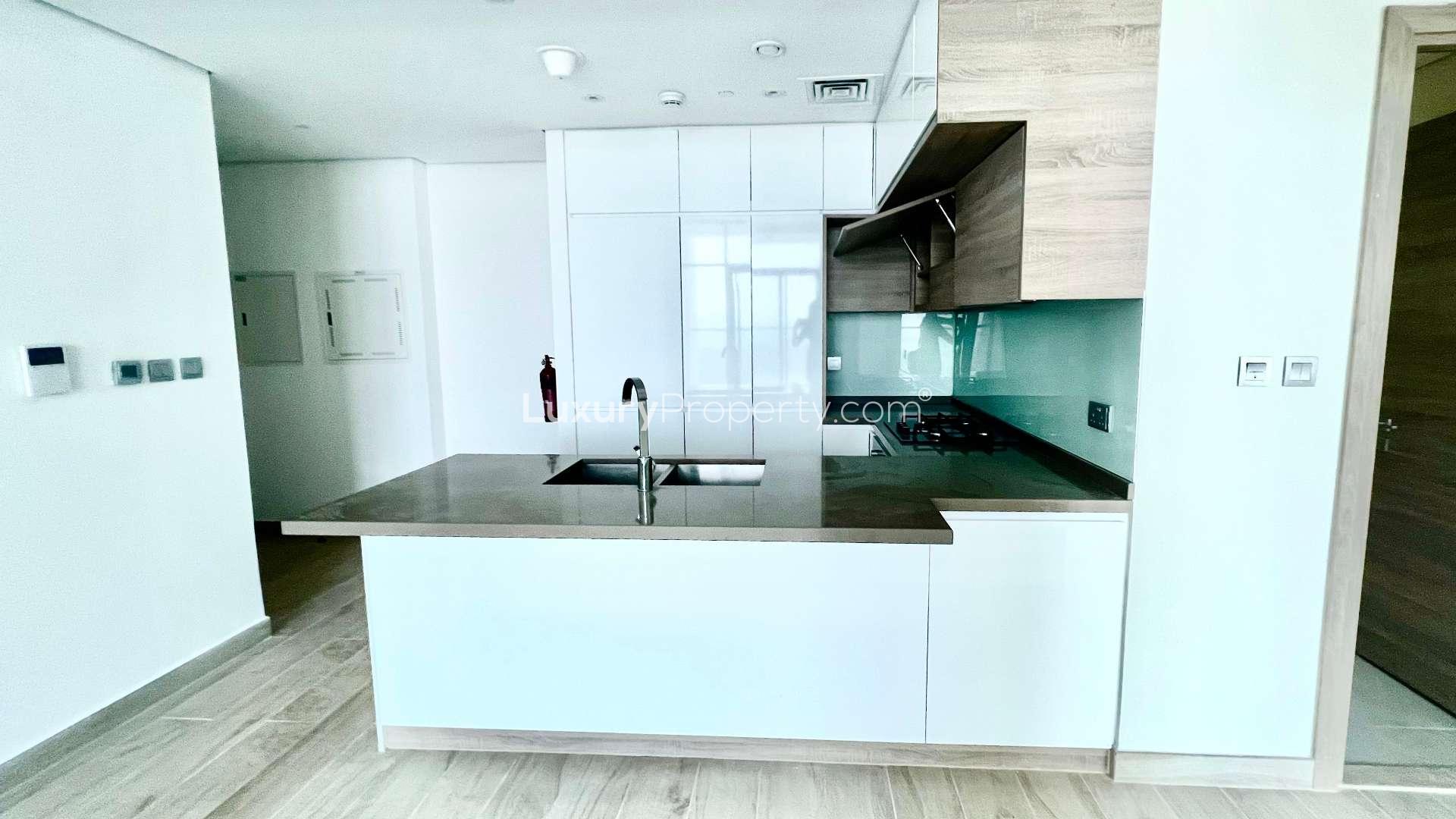 Empty bedroom with large window in Studio One, Dubai Marina apartment for rent