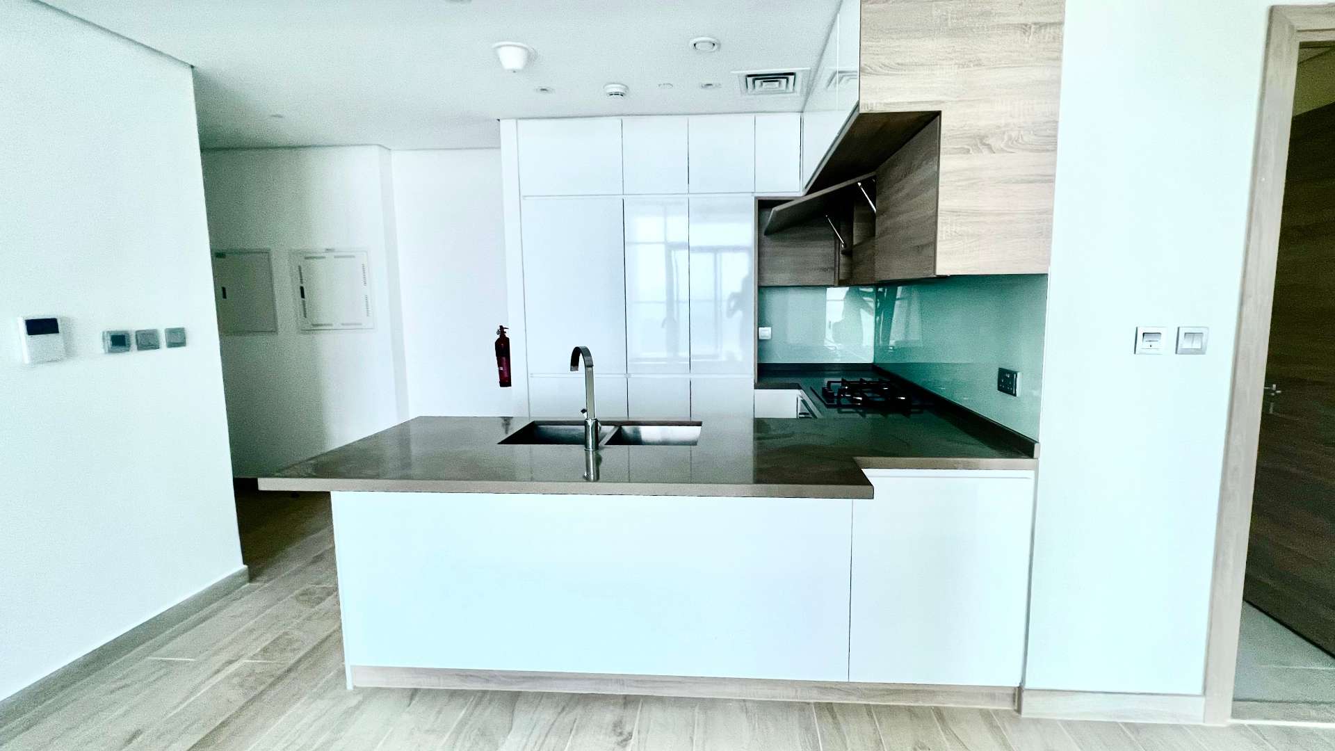 Empty bedroom with large window in Studio One, Dubai Marina apartment for rent