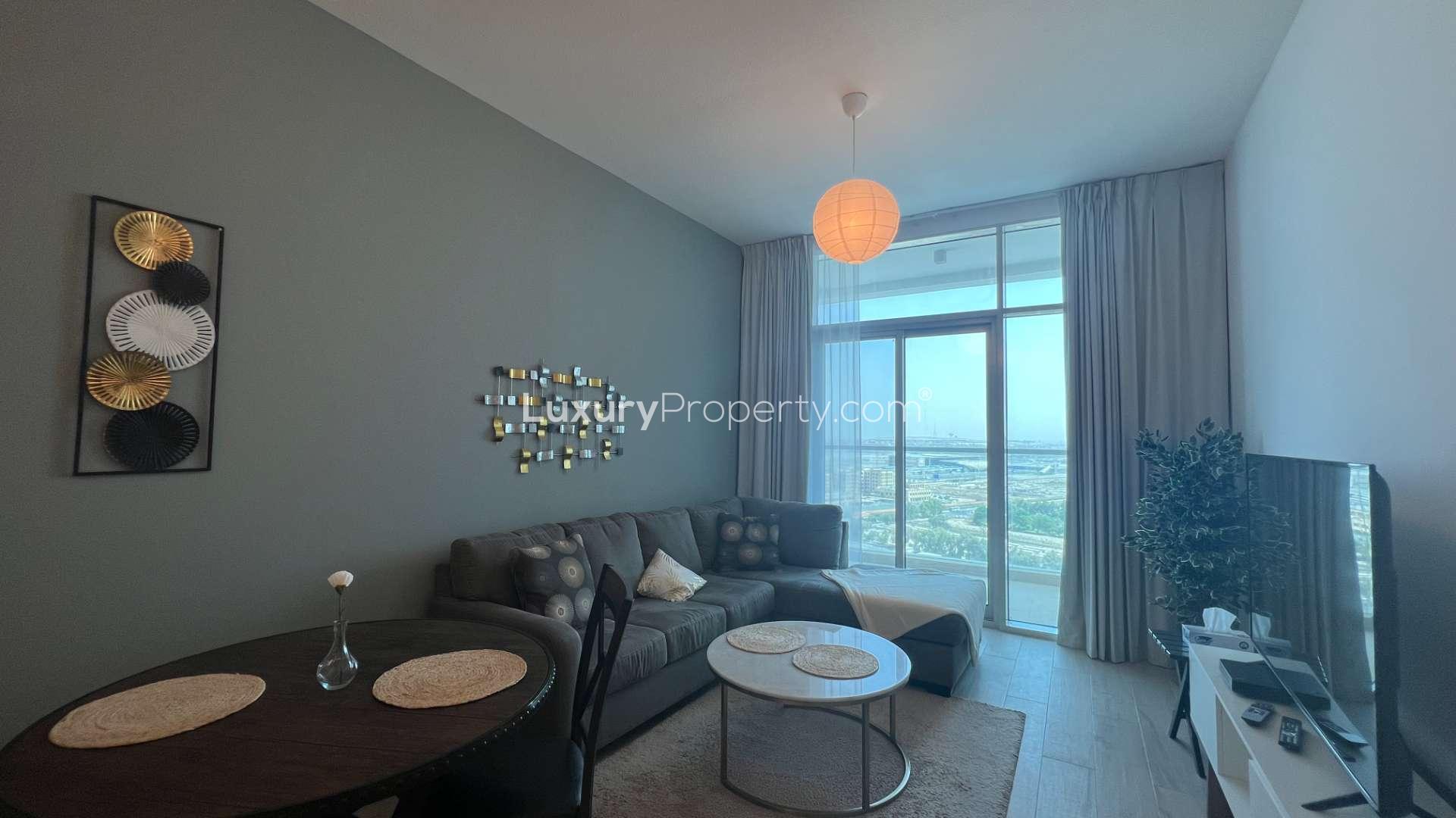 Balcony view from modern one-bedroom apartment in Studio One, Dubai Marina, overlooking cityscape