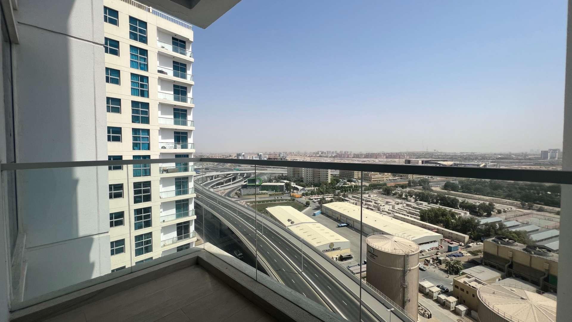 Fully furnished living room in modern one-bedroom apartment, Studio One, Dubai Marina