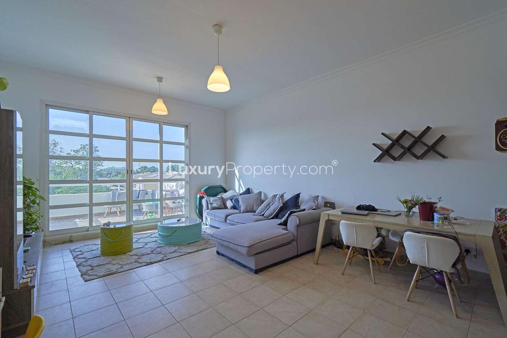 Living room in spacious 1-bedroom lakeside apartment, Green Community East, Lake Apartments