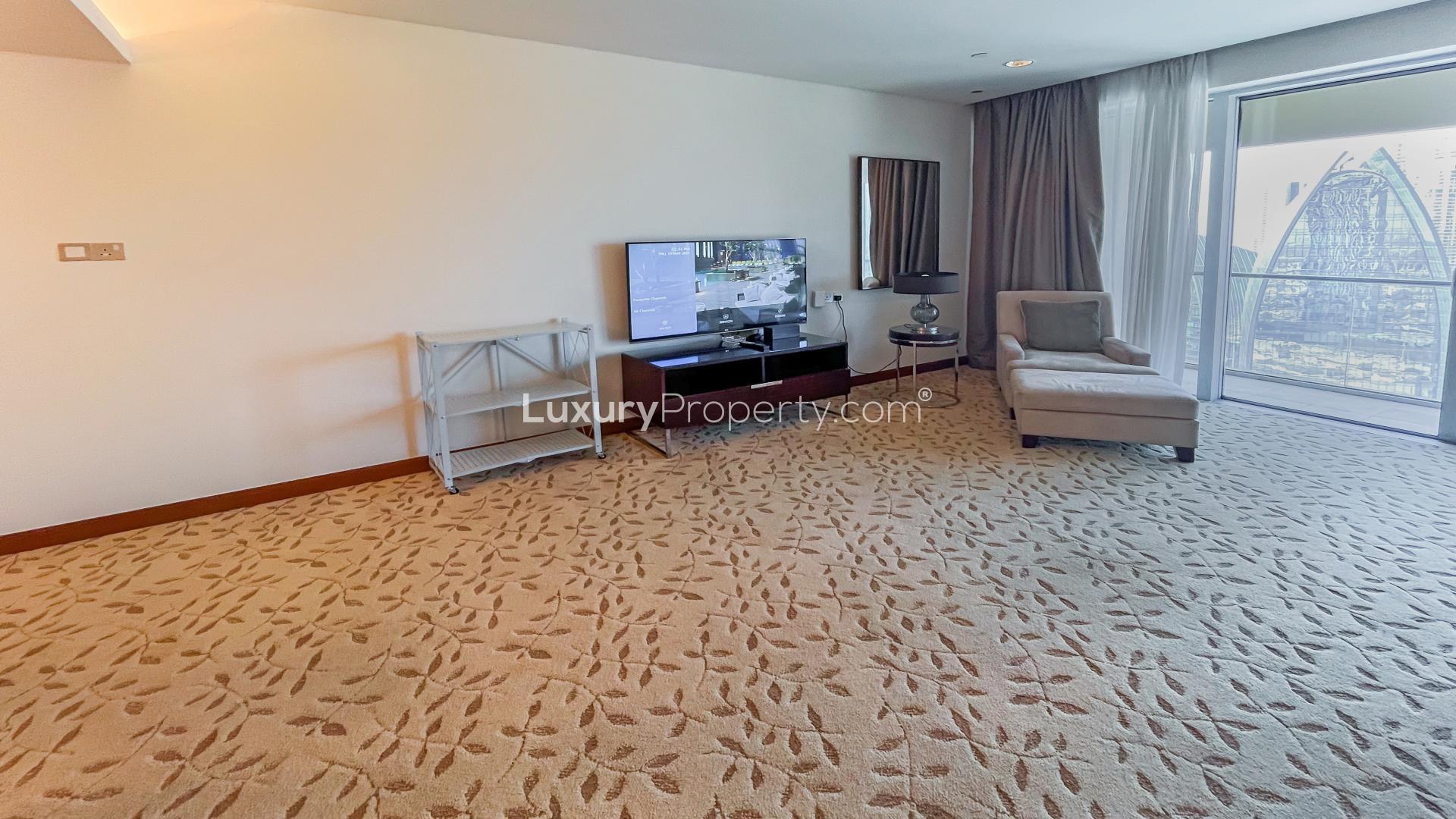 Balcony view from studio apartment in Address Dubai Mall, overlooking Downtown Dubai skyline