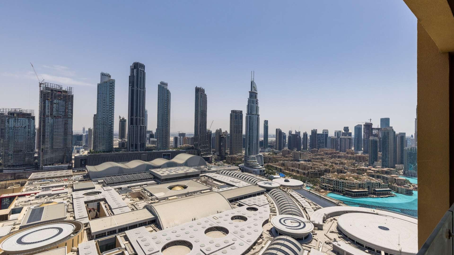 High-floor view of Downtown Dubai skyline from The Address Dubai Mall apartment balcony