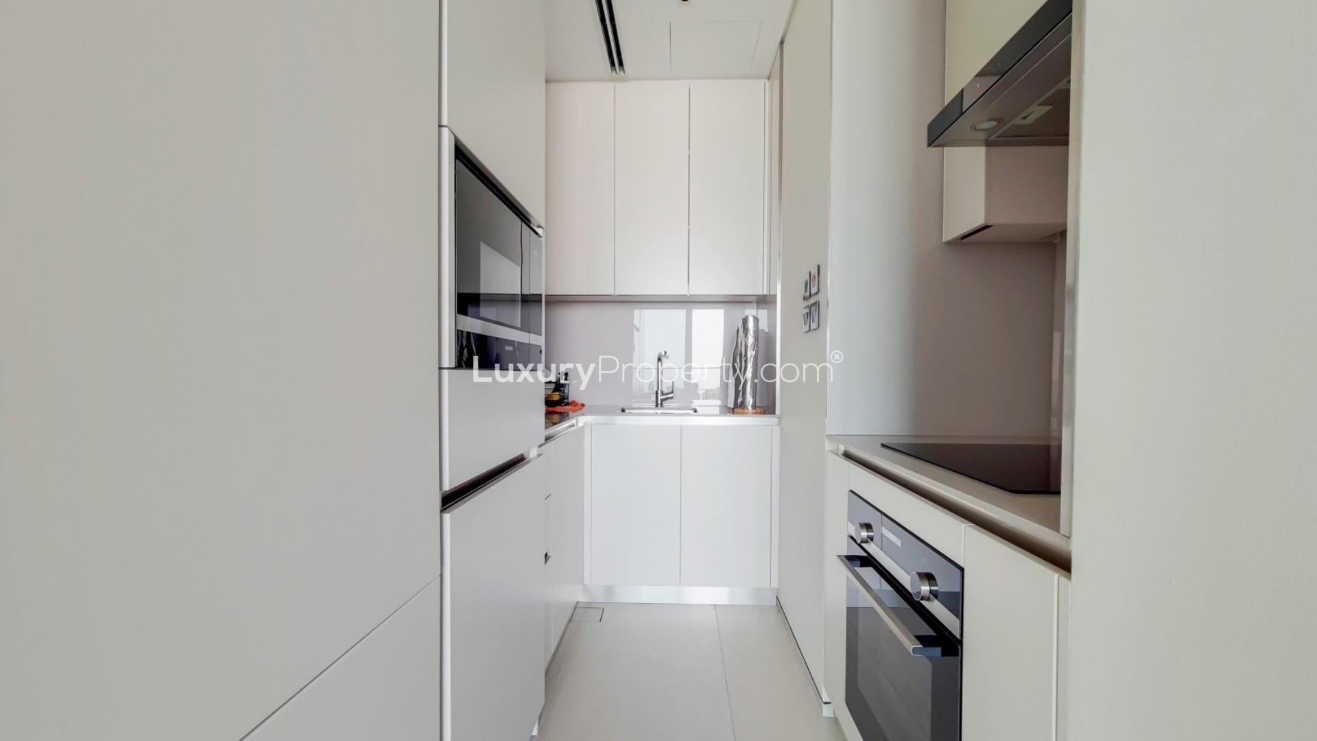 Serviced apartment interior at The Address Jumeirah Resort, modern living area with amenities