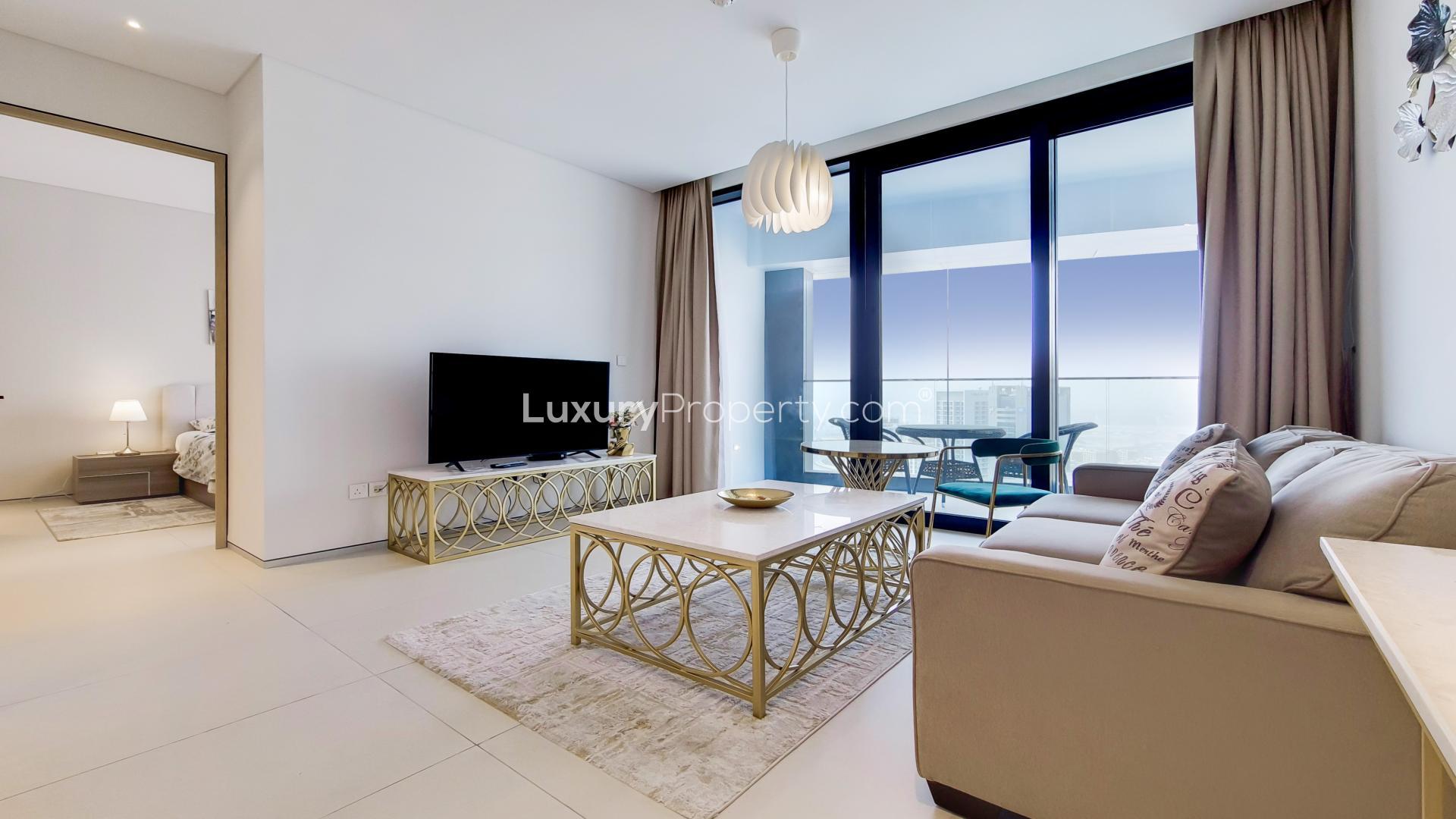 Balcony view from prime Jumeirah Beach Residence apartment overlooking marina skyline