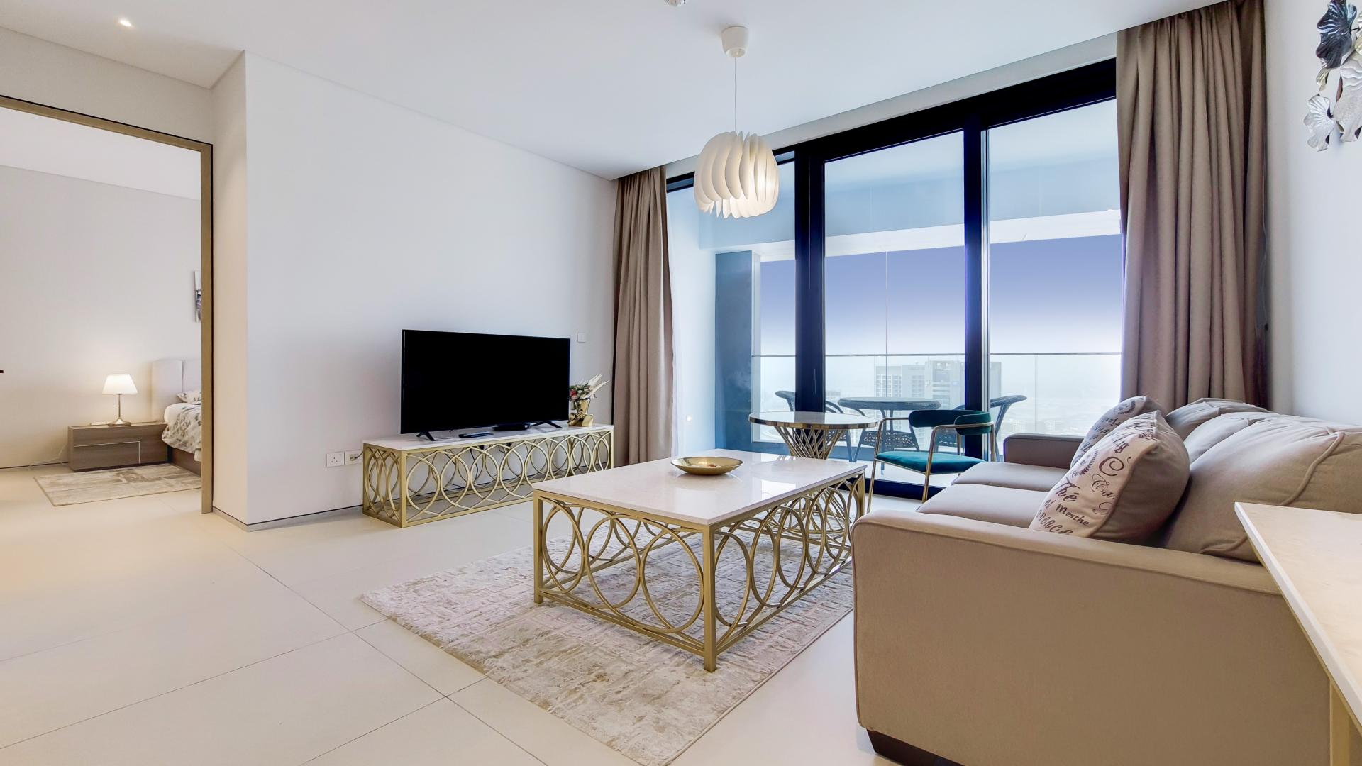 Balcony view from prime Jumeirah Beach Residence apartment overlooking marina skyline