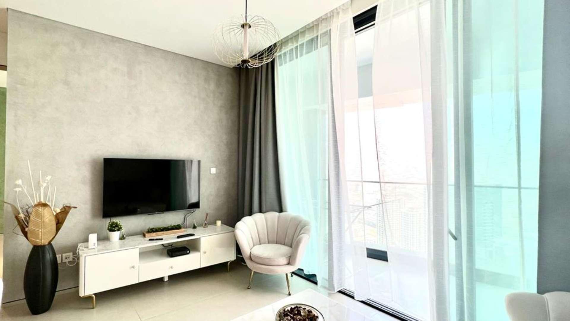 "Stunning view from luxury apartment at The Address Jumeirah Resort, Jumeirah Beach Residence.",Balcony view from luxury apartment at The Address Jumeirah Resort, overlooking marina and cityscape