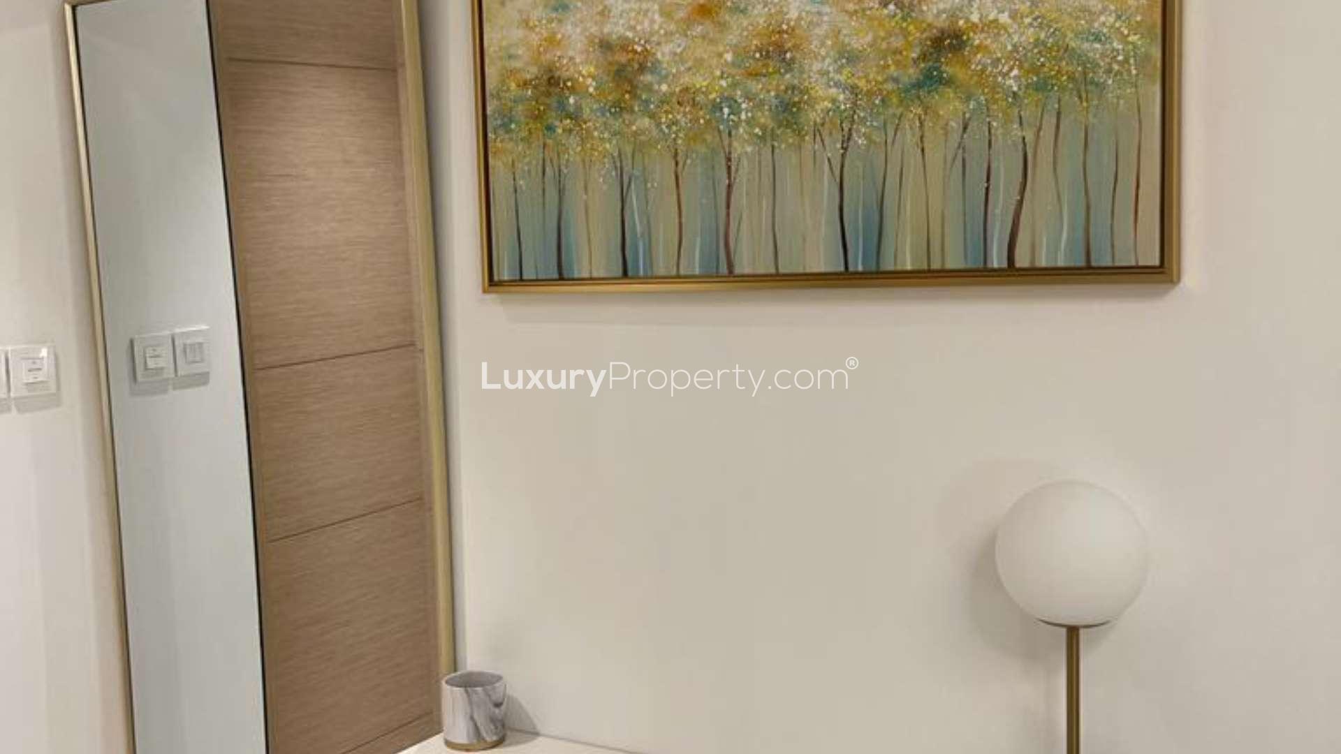 Furnished living room with elegant seating in Jumeirah Beach Residence apartment for rent