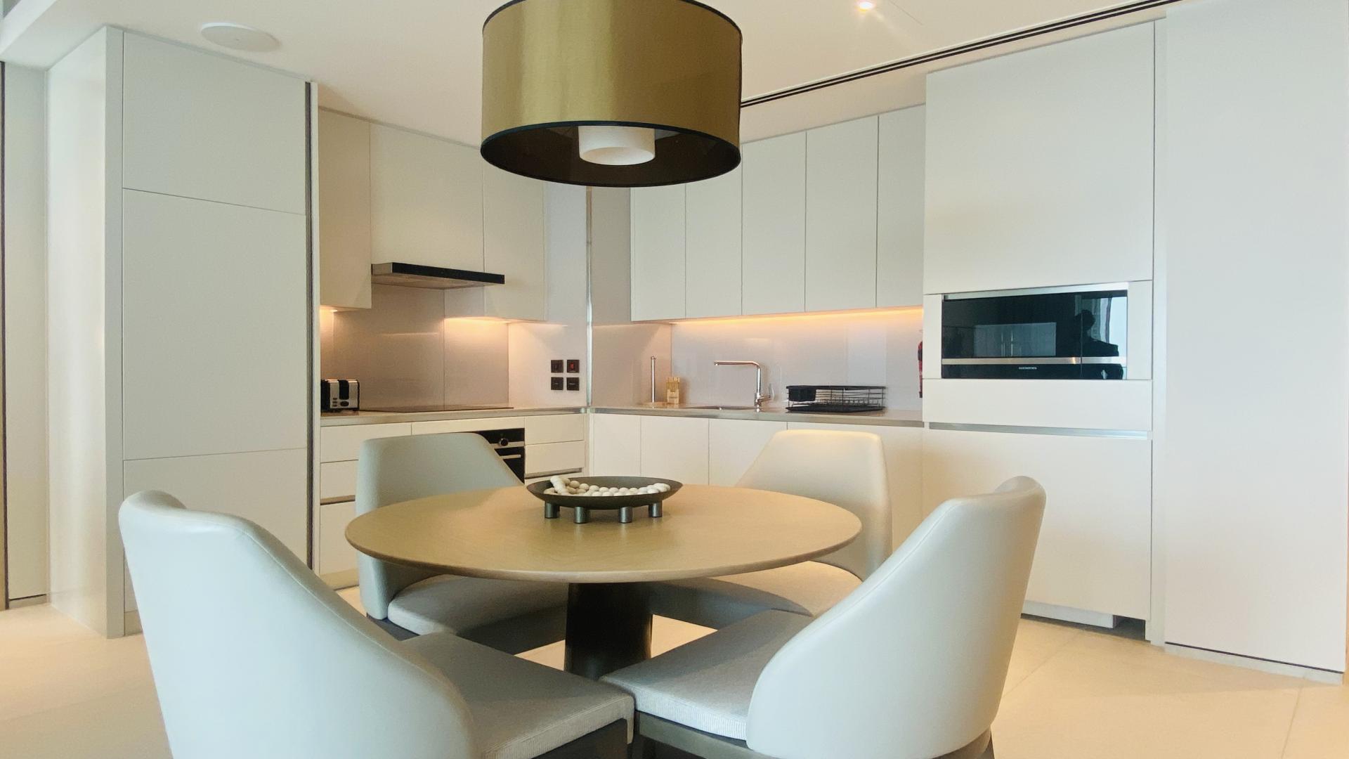 Furnished living room with balcony view in Jumeirah Beach Residence apartment for rent