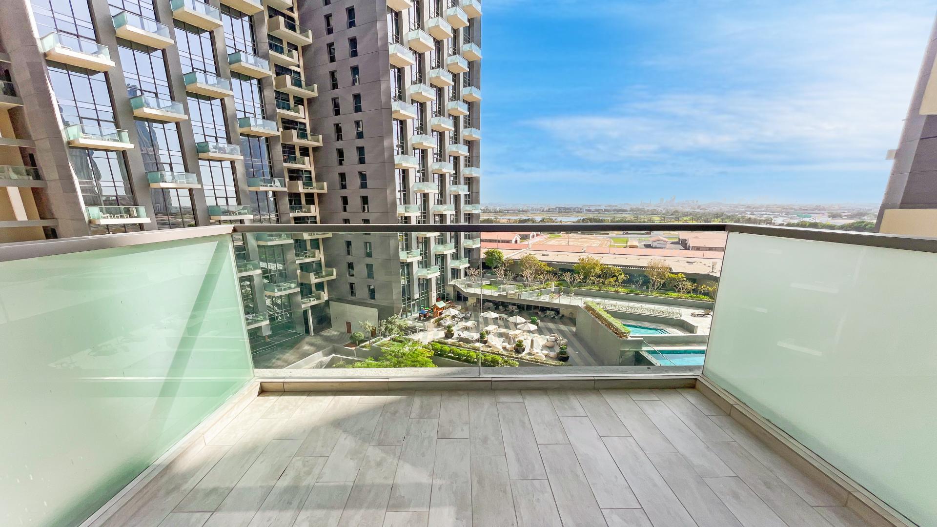 Balcony view from luxury apartment in The Atria, Business Bay, overlooking pool and courtyard
