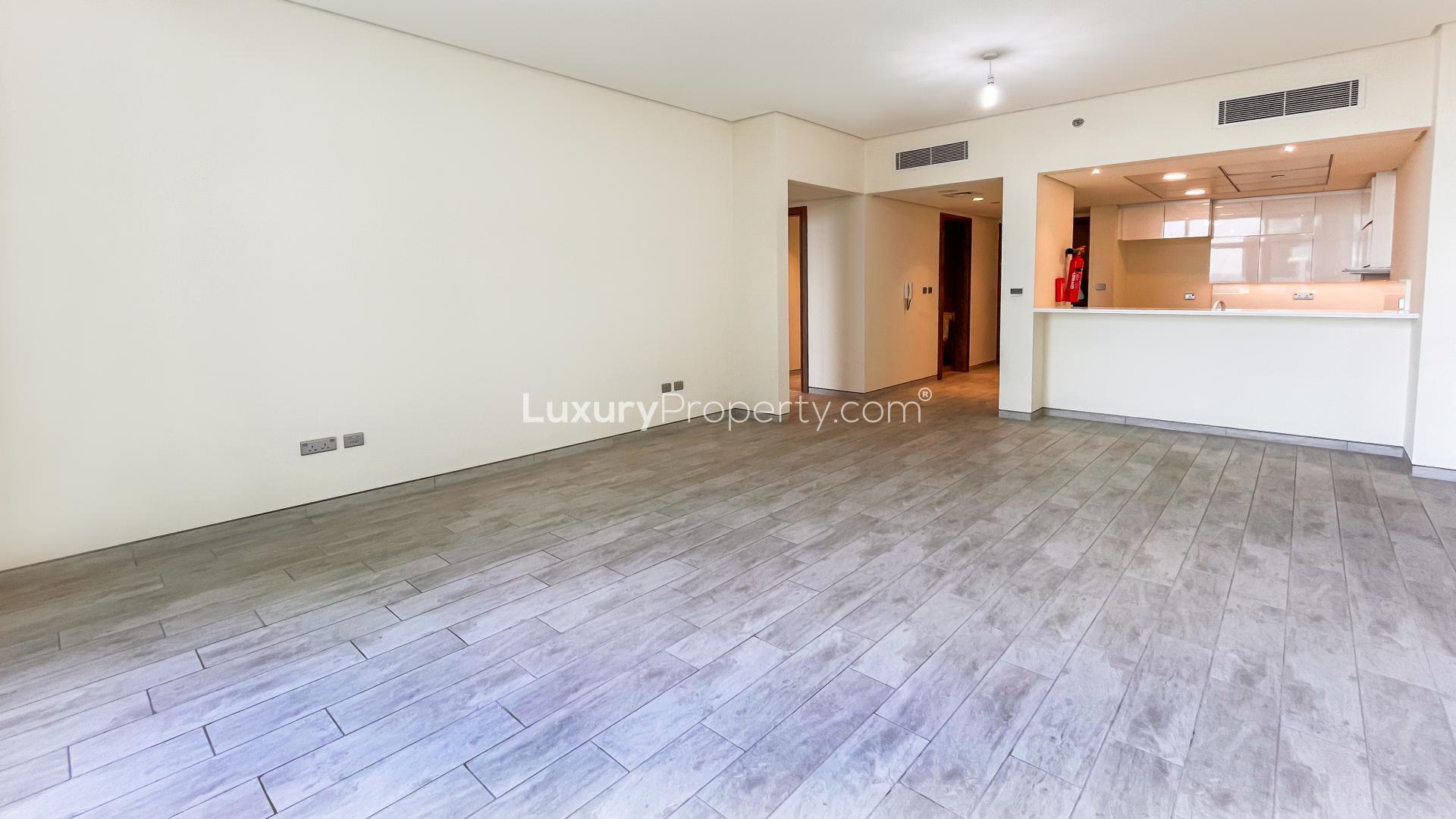 Luxury unfurnished apartment balcony with stunning pool views in The Atria, Business Bay