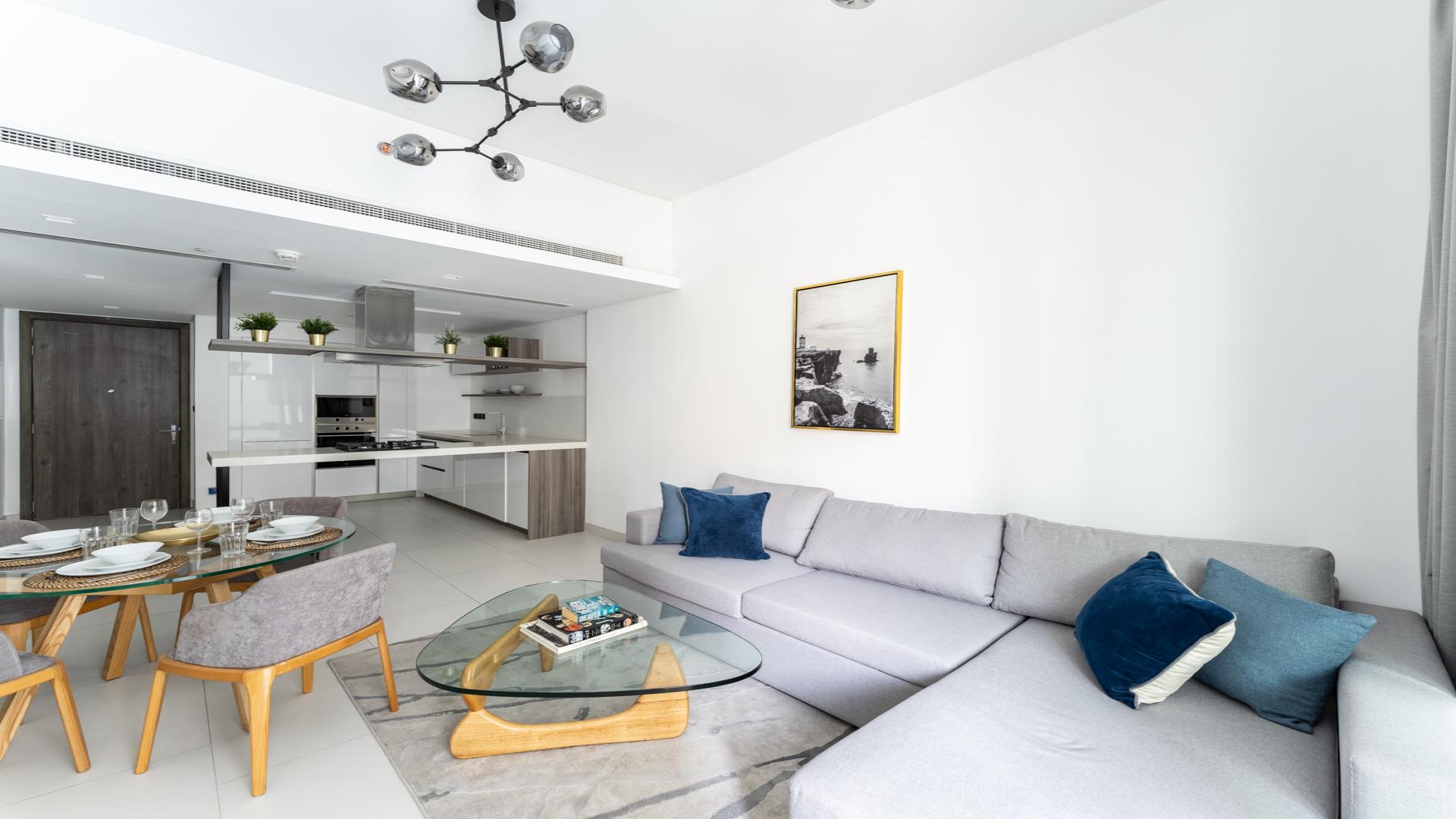 Elegant living area in upgraded 1-bedroom apartment, Soho Palm Jumeirah, with modern furnishings