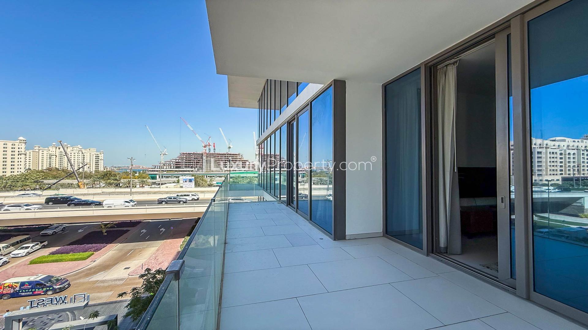 Modern kitchen and living area in Soho Palm Jumeirah apartment for rent, LP48391