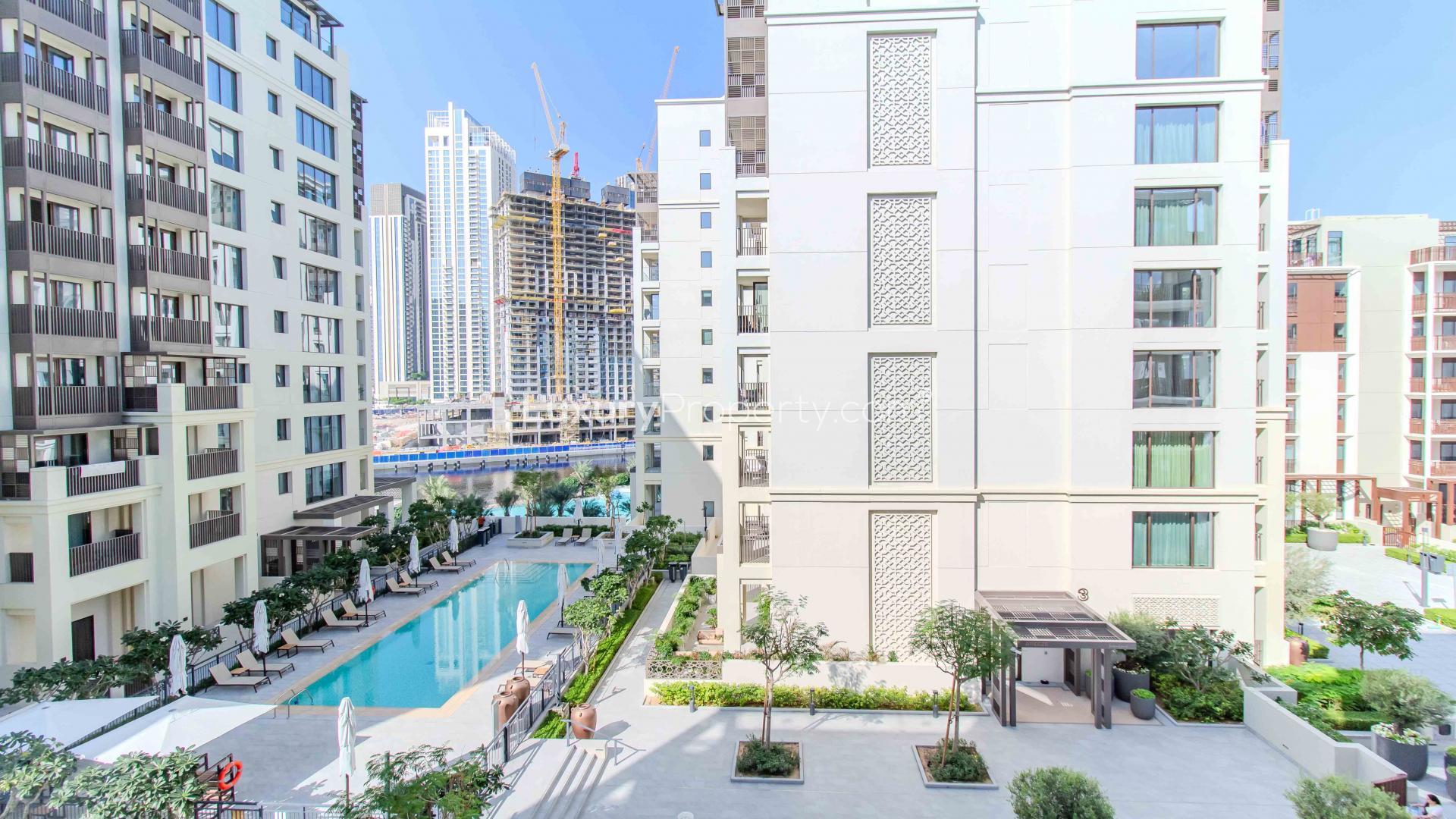 Modern living room and kitchen in 1-bedroom apartment, Breeze, Creek Beach, Dubai Creek Harbour