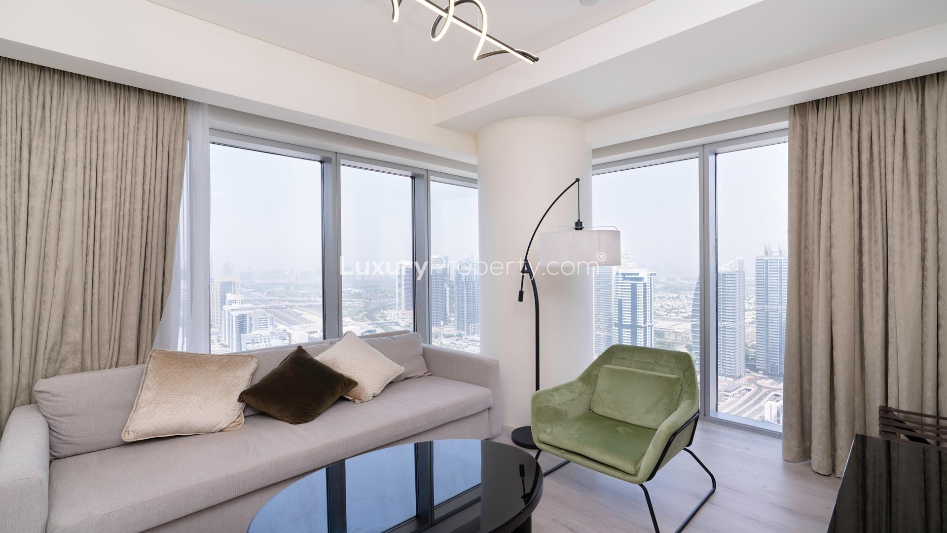 Furnished living room with city view in The Address Dubai Marina apartment for rent