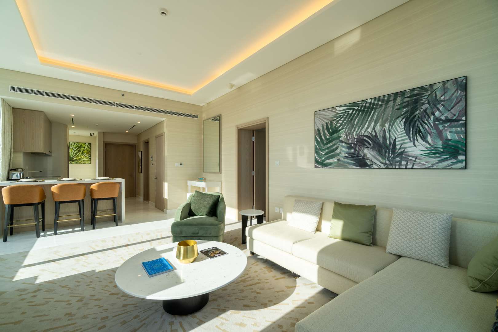 High-floor Palm Tower apartment living room with panoramic views and modern decor