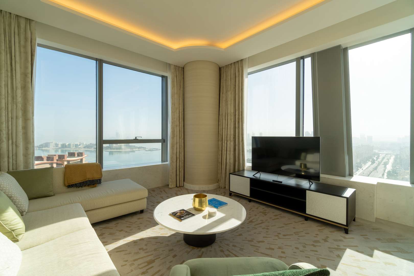 High-floor Palm Tower apartment living room with ocean view, modern furnishings, Palm Jumeirah