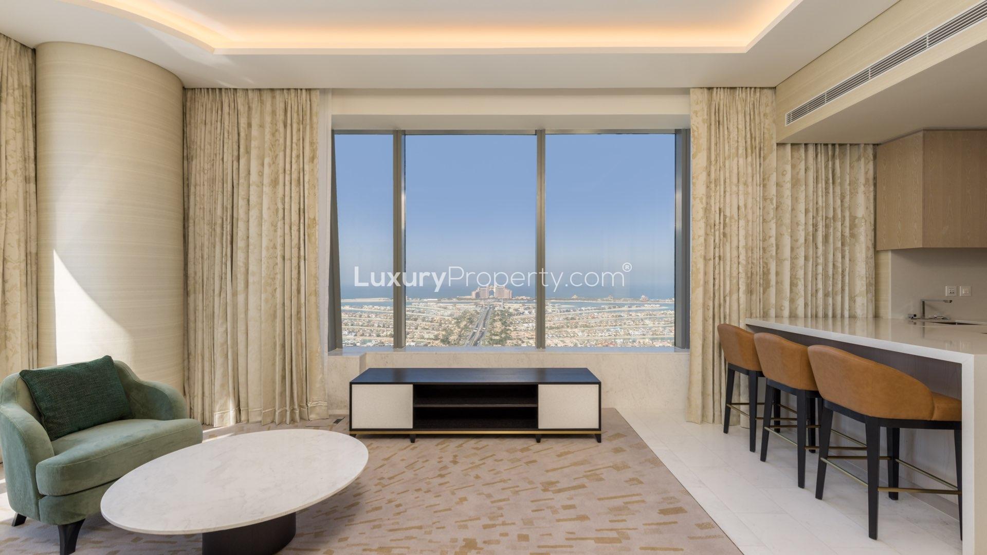 "Stylish furnished living room with Palm Jumeirah view in The Palm Tower apartment.",Fully furnished Palm Jumeirah apartment with stunning views from The Palm Tower living area