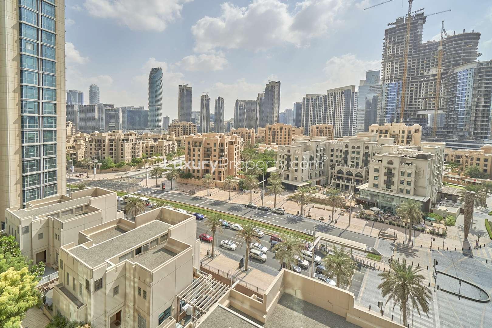 Bright living room with large windows in Downtown Dubai apartment, The Residences