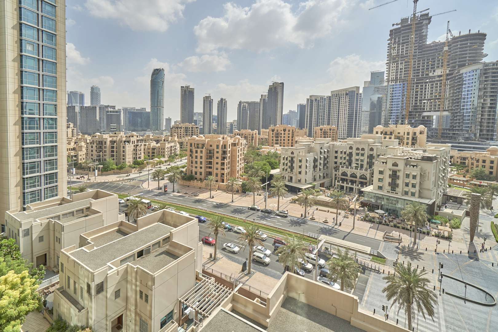 Bright living room with large windows in Downtown Dubai apartment, The Residences