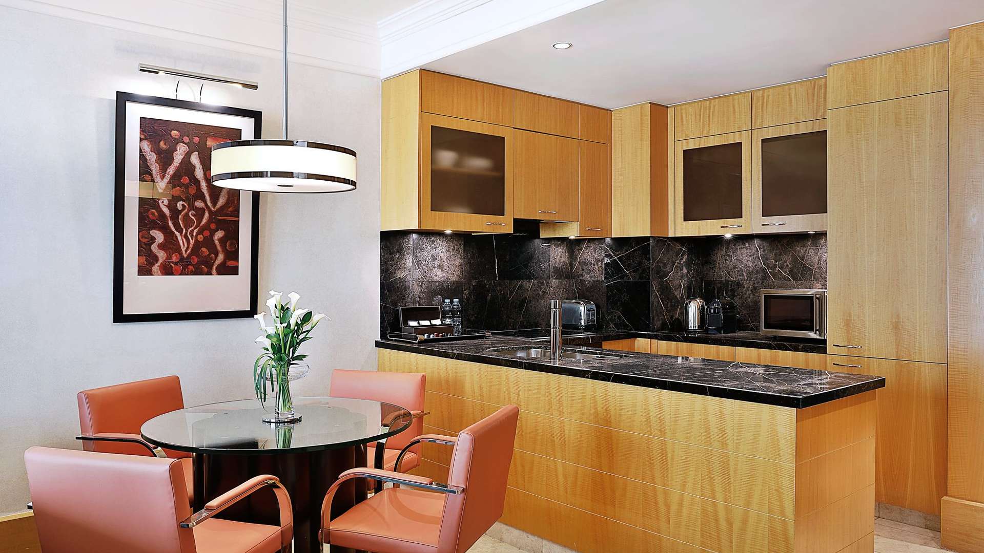 N/A,Luxurious kitchen and dining area in furnished 1-bedroom apartment, Ritz-Carlton Residences, DIFC